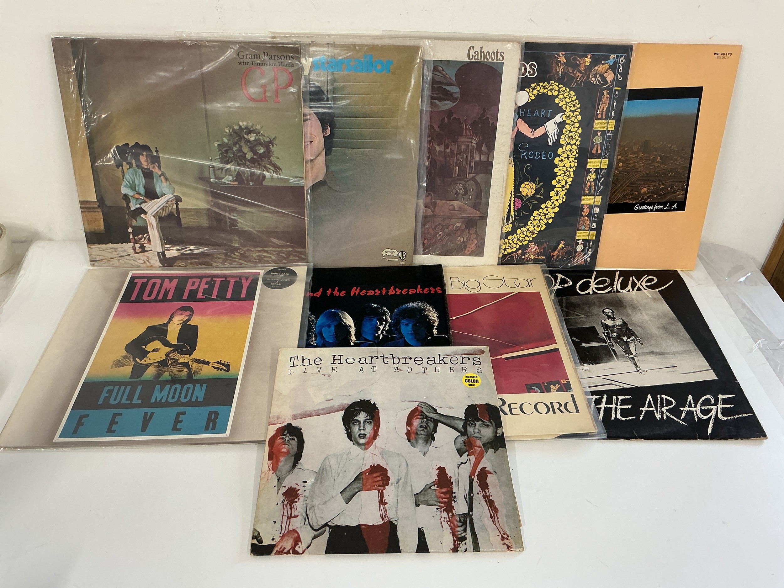 Ten LPs by various artists including Tom Petty, The Byrds, Gram Parsons and others.