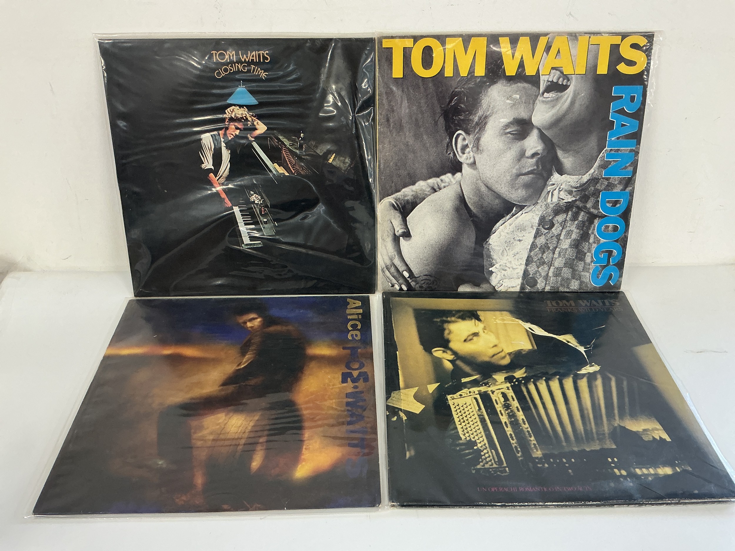 Four Tom Waits LPs comprising Rain Dogs, Closing Time, Franks Wild Years and Alice.