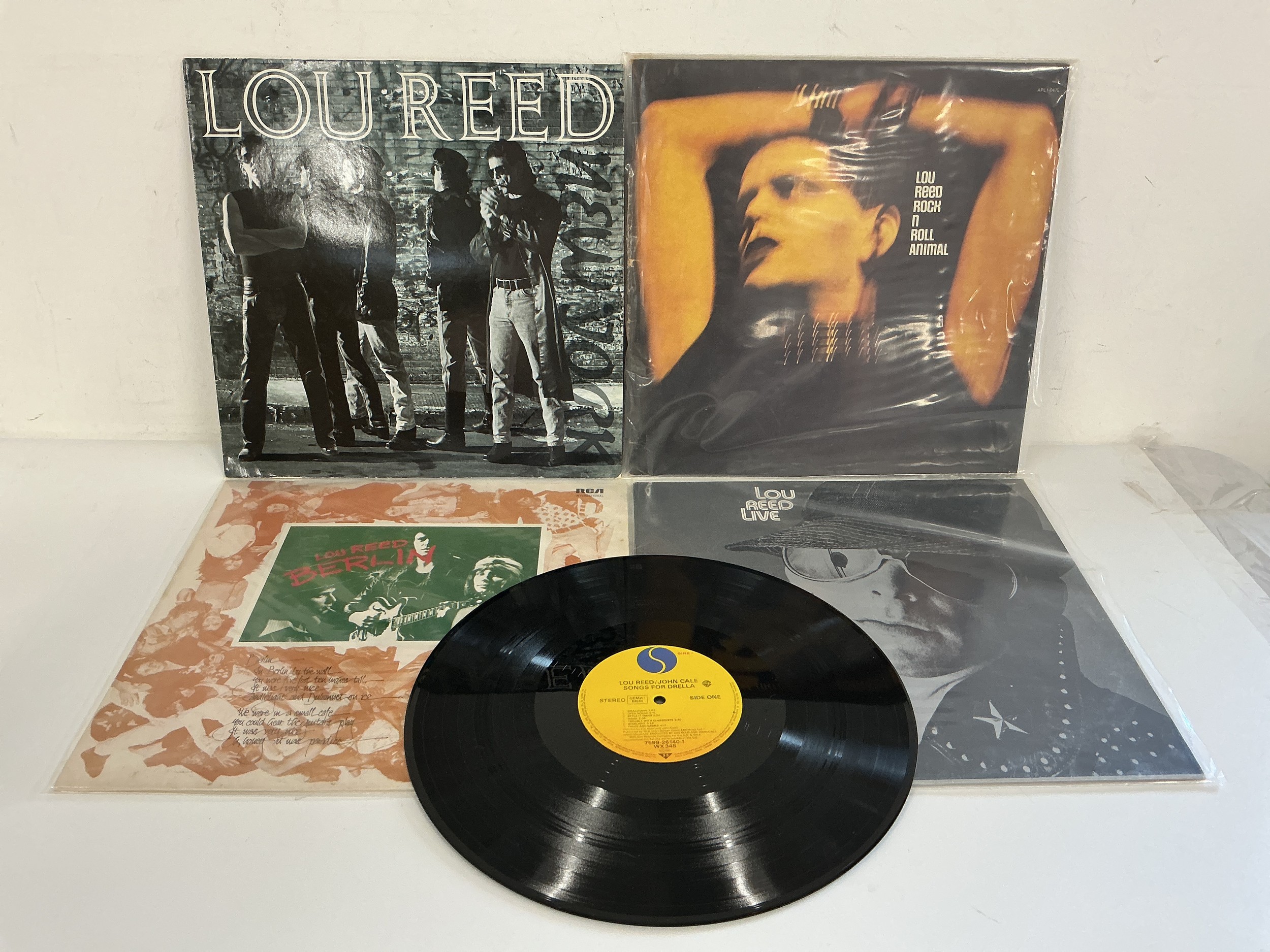 Five Lou Reed LPs comprising Berlin, Rock n Roll Animal, New York, Live and Songs For Drella (no sleeve).