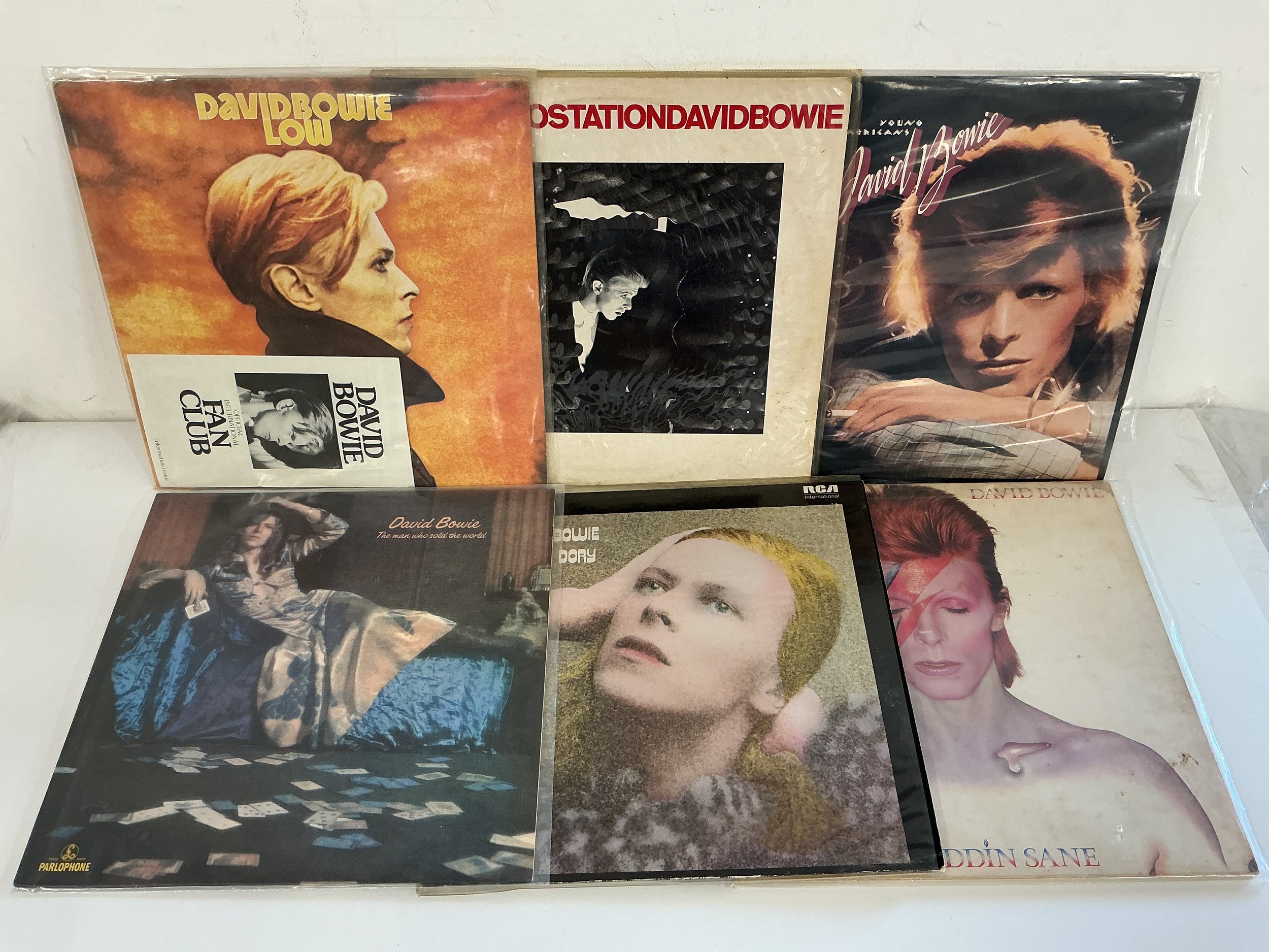Six David Bowie LPs comprising early UK pressings of Low, Station To Station, Aladdin Sane and others including a 180g pressing of The Man Who Sold The World.