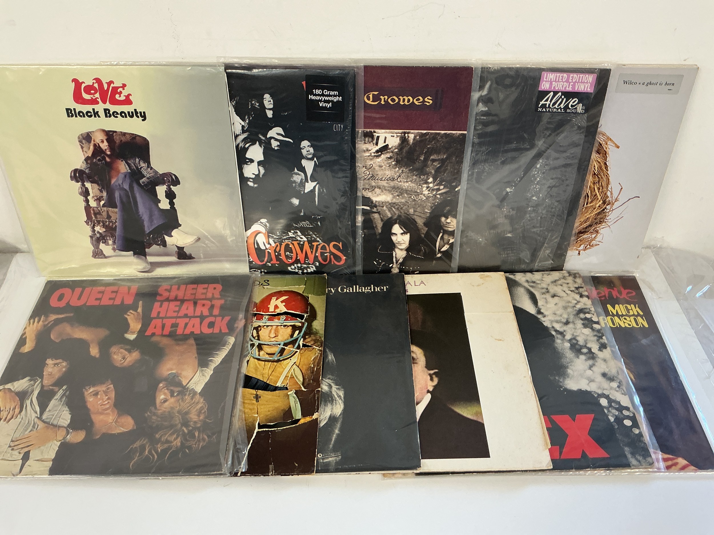 Eleven LPs by various artists comprising The Who, Queen, T Rex and others.