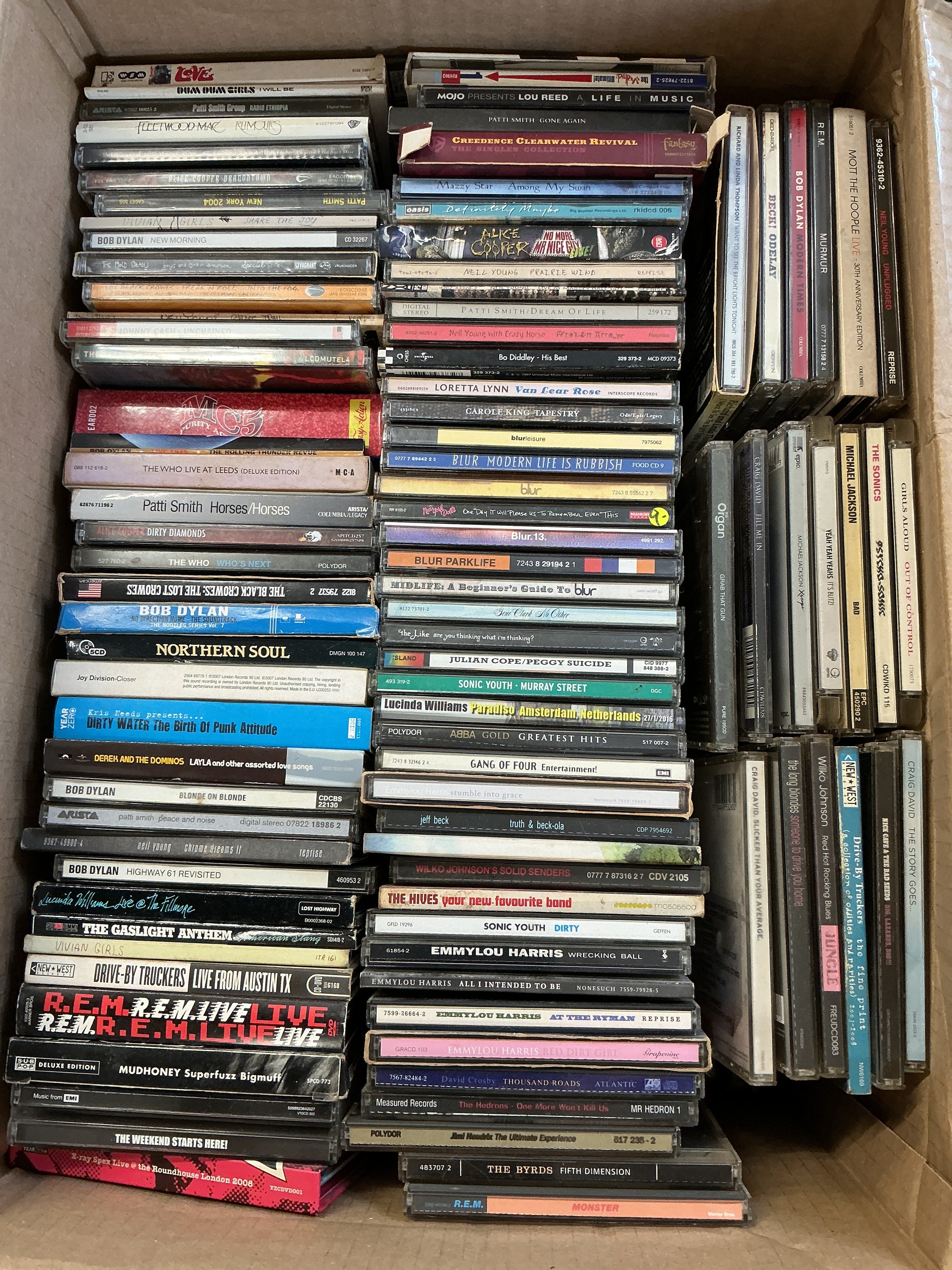 Two boxes of CDs by various artists including PiL, Mudhoney, Blur, Pixies and many more plus some music DVDs.
