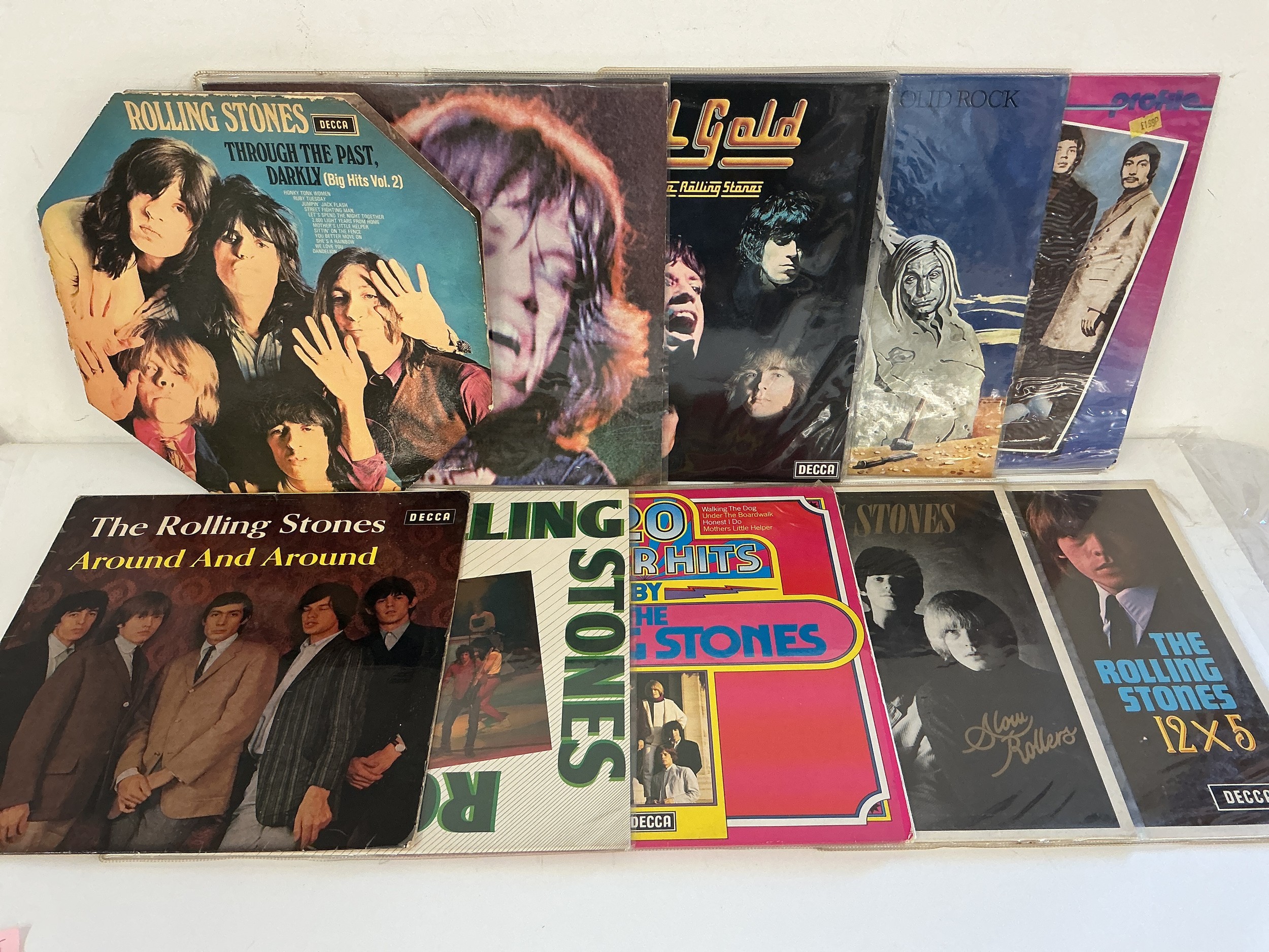 A collection of Rolling Stones compilation LPs, some foreign pressings, plus various Stones 7" singles and EPs.