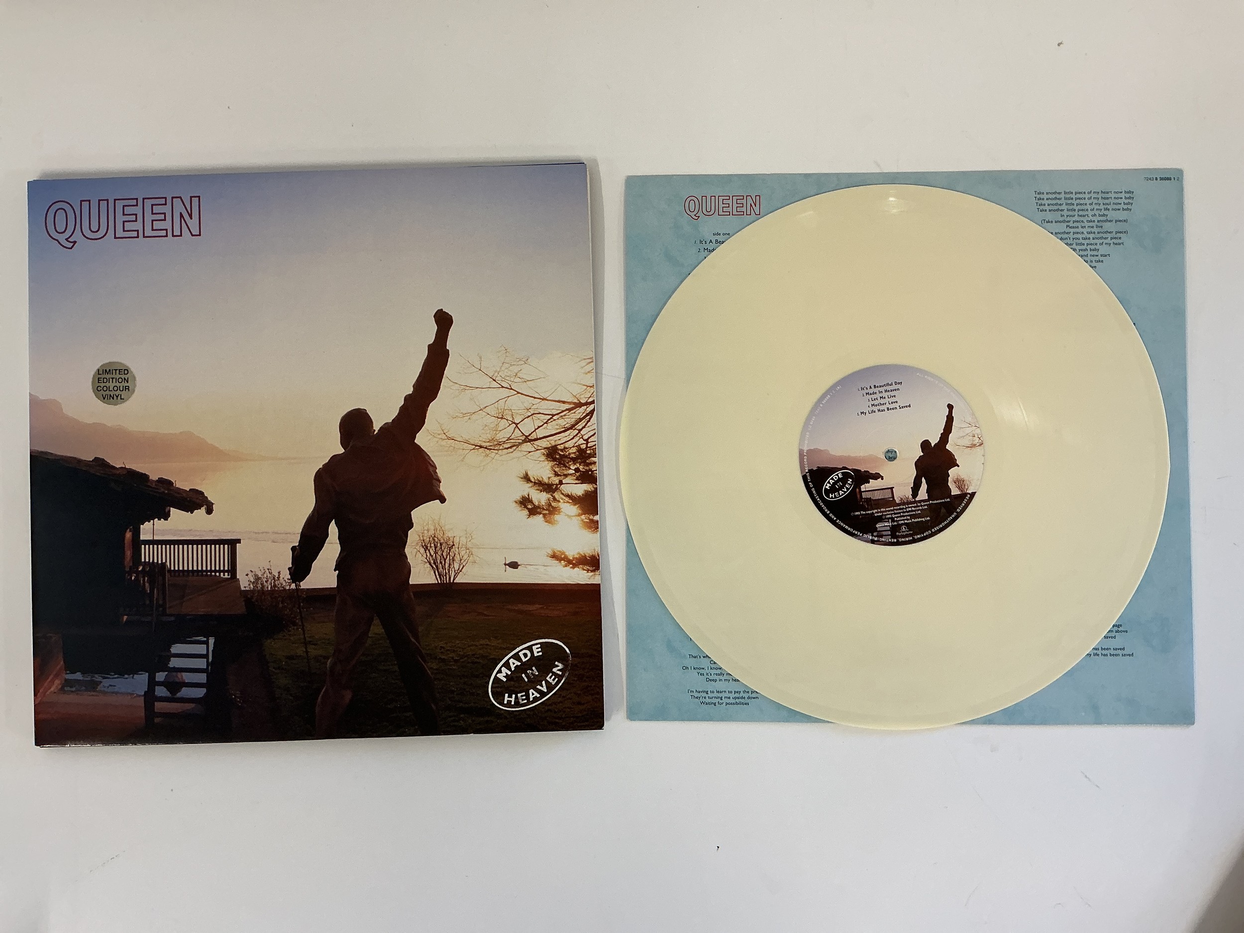 A limited edition Queen - Made In Heaven LP on ivory coloured vinyl. Complete with poster inserts. Vinyl NM.