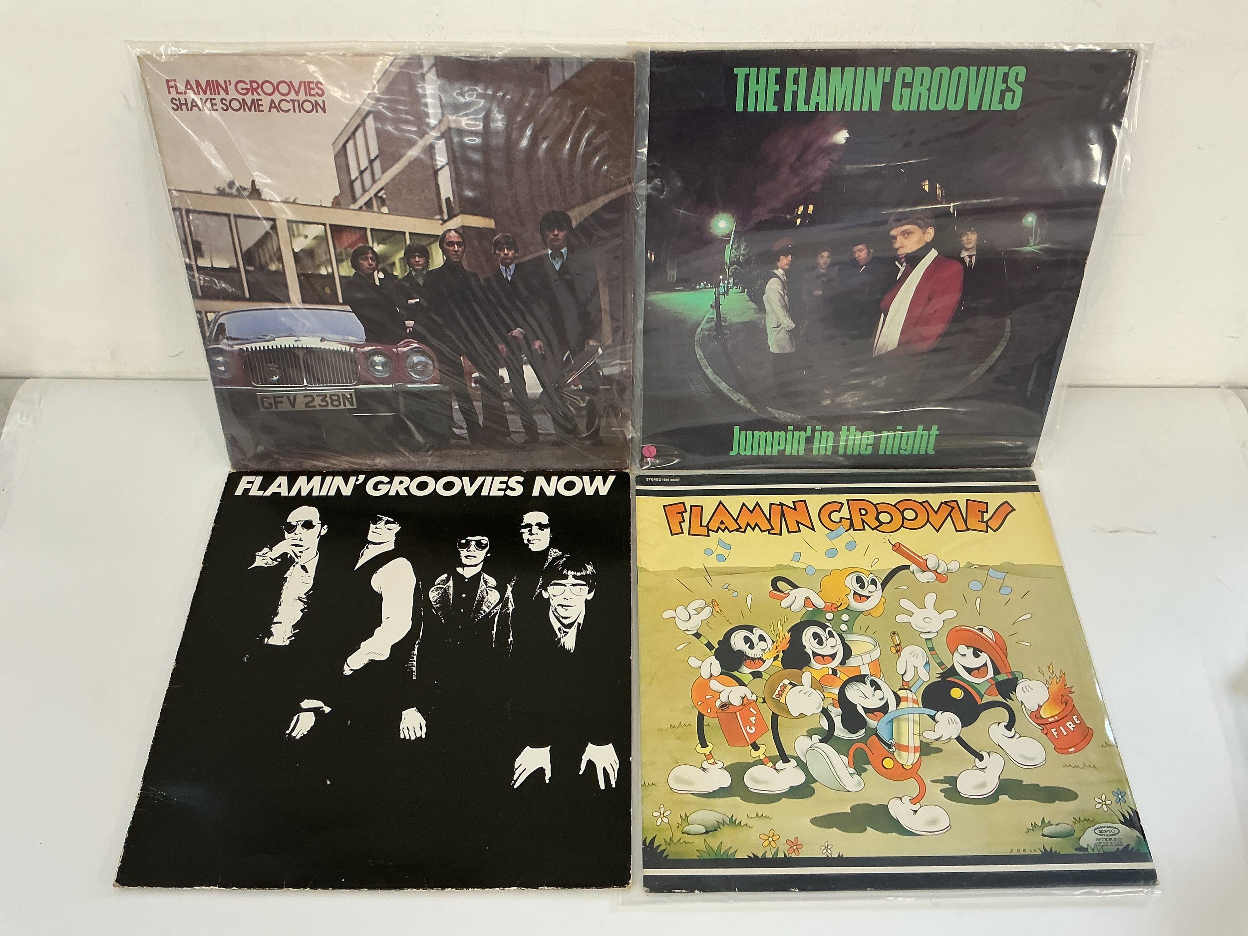 Four LPs by The Flaming Groovies comprising Shake Some Action, Jumpin In The Night and others.