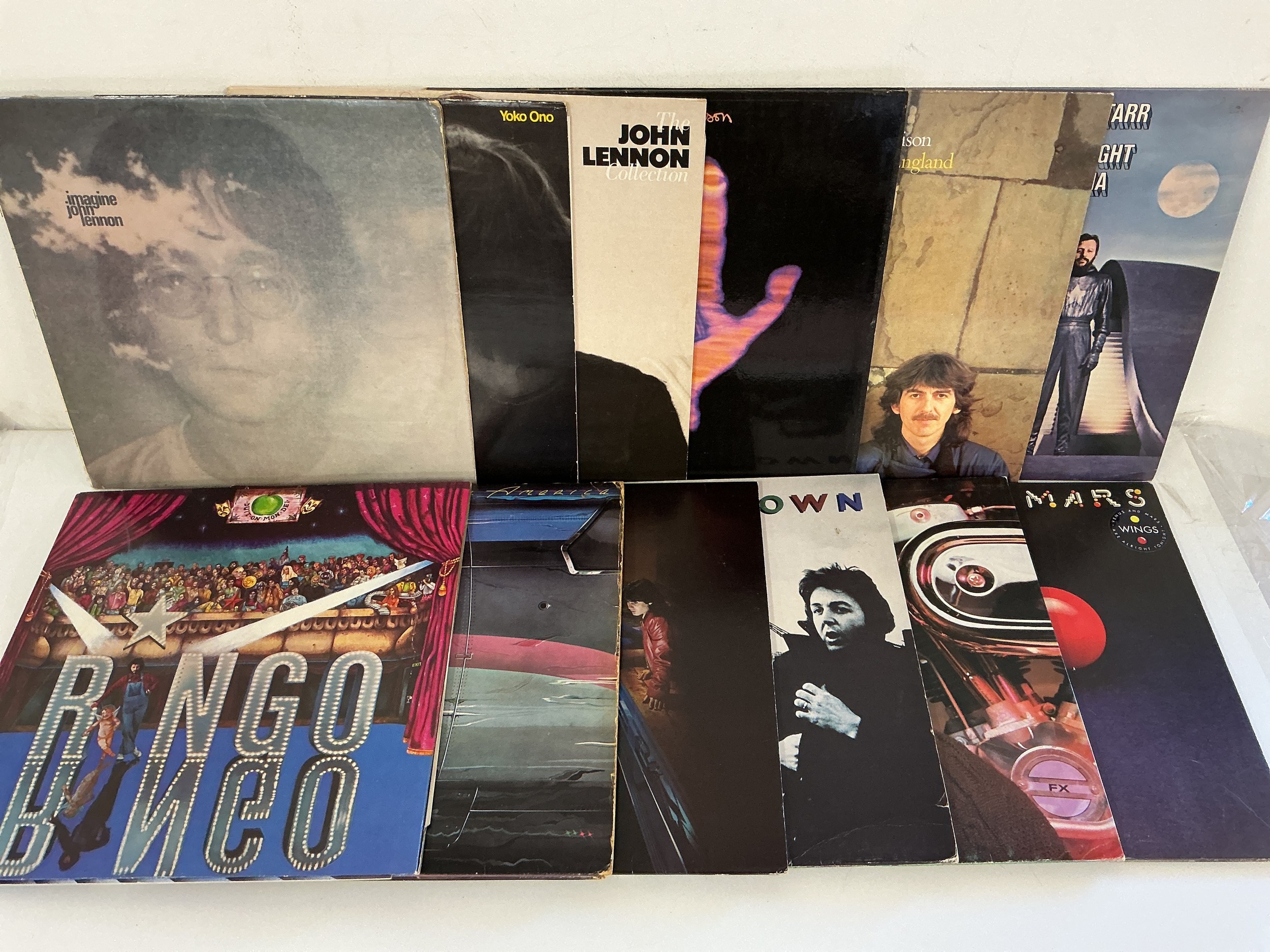 Twelve solo Beatles LPs comprising Living In The Material World, Venus & Mars, Ringo and others.