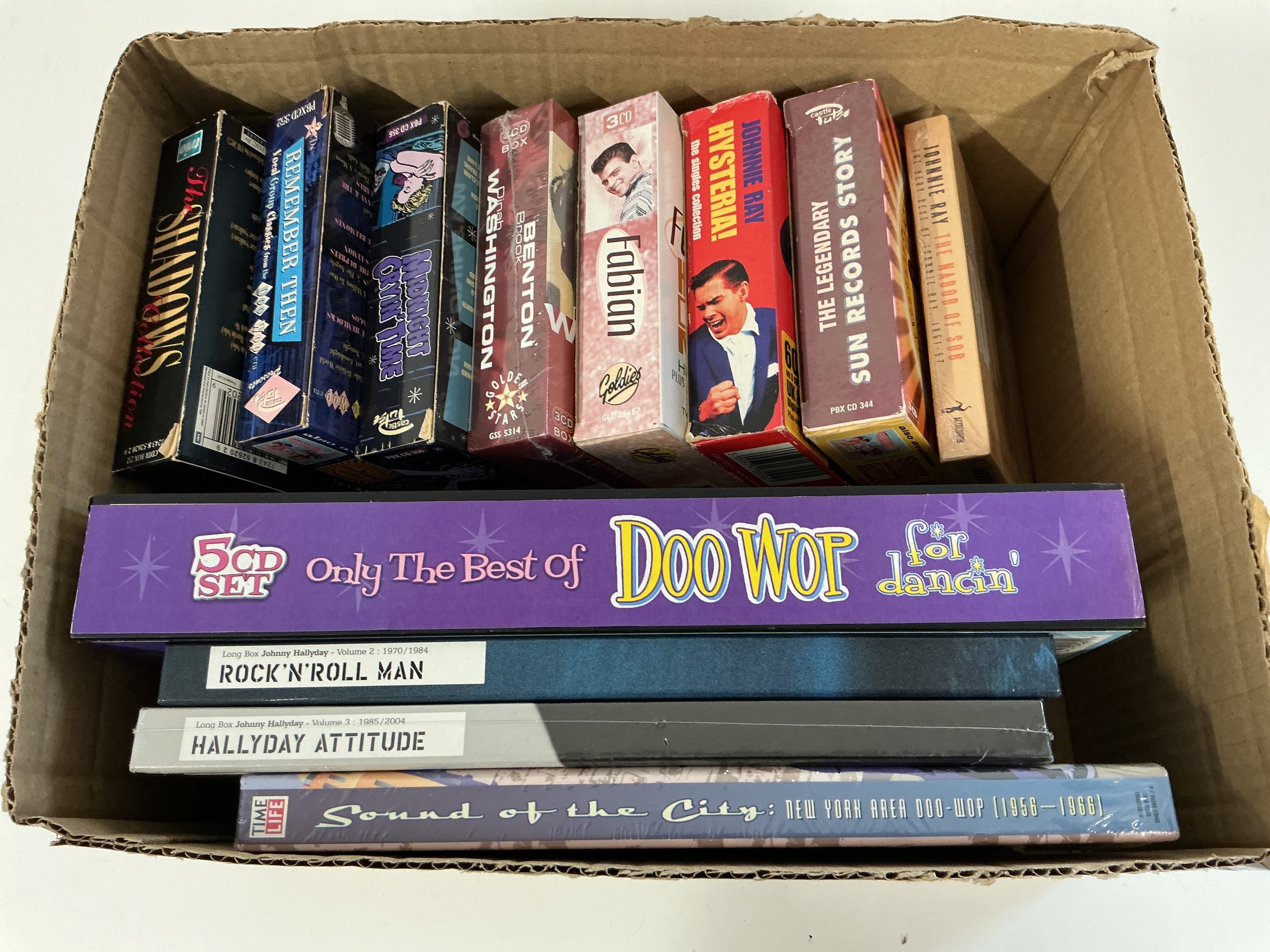 A small collection of mainly rock n roll CD box sets, some sealed.