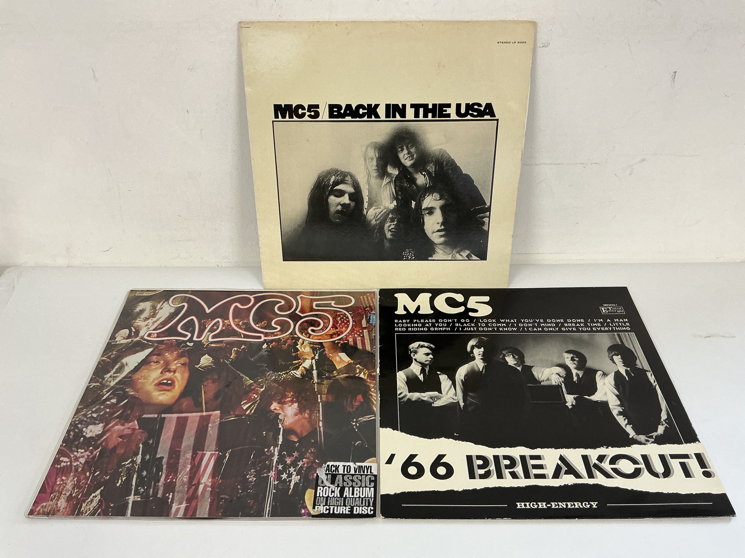 Three LPs by MC5, all reissues including a Kick Out The Jams picture disc.