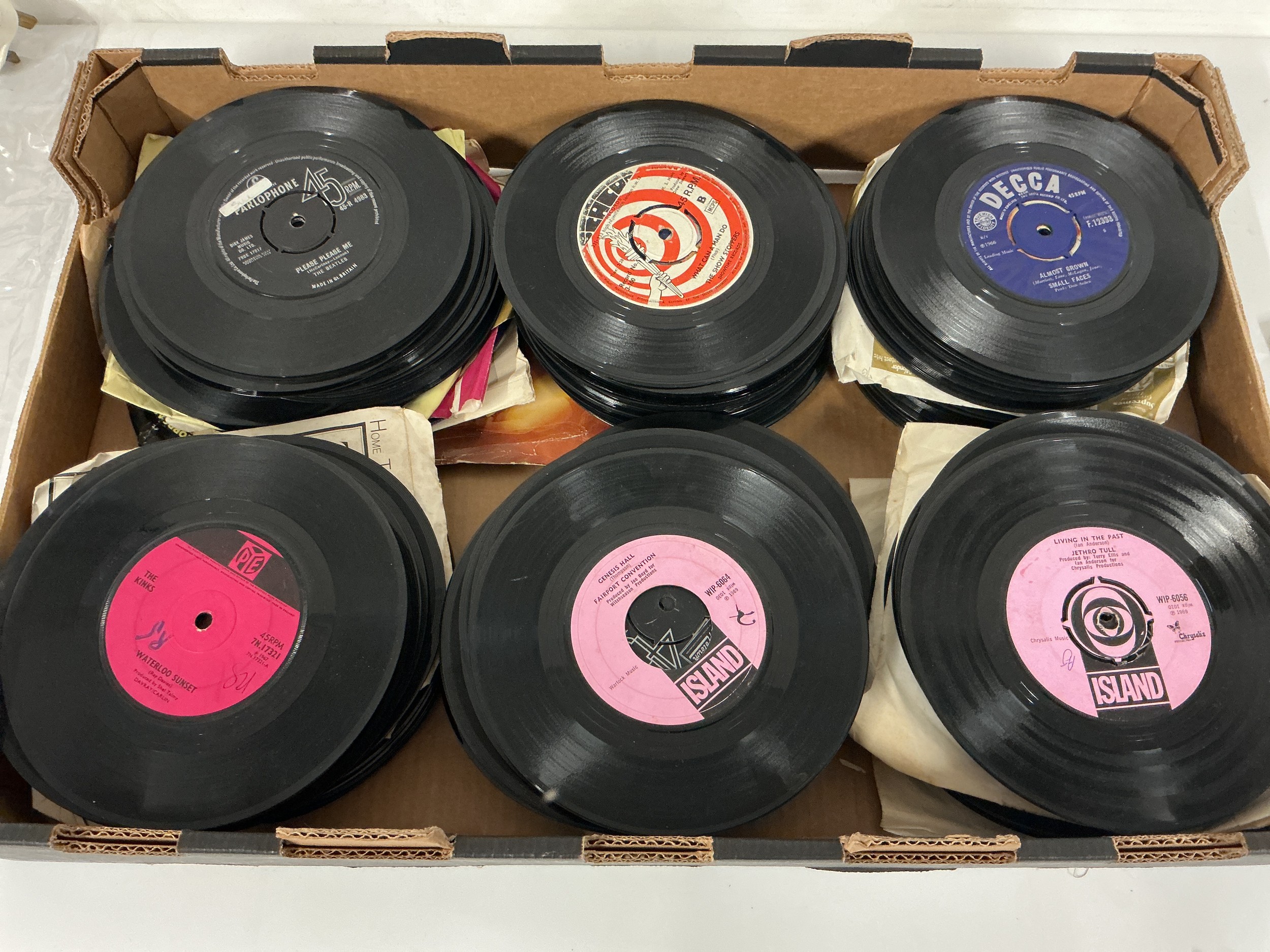 A collection of 7" singles and EPs by various artists including a copy of See Emily Play by Pink Floyd plus releases by The Beatles, Jimi Hendrix, Fairport Convention and many more.