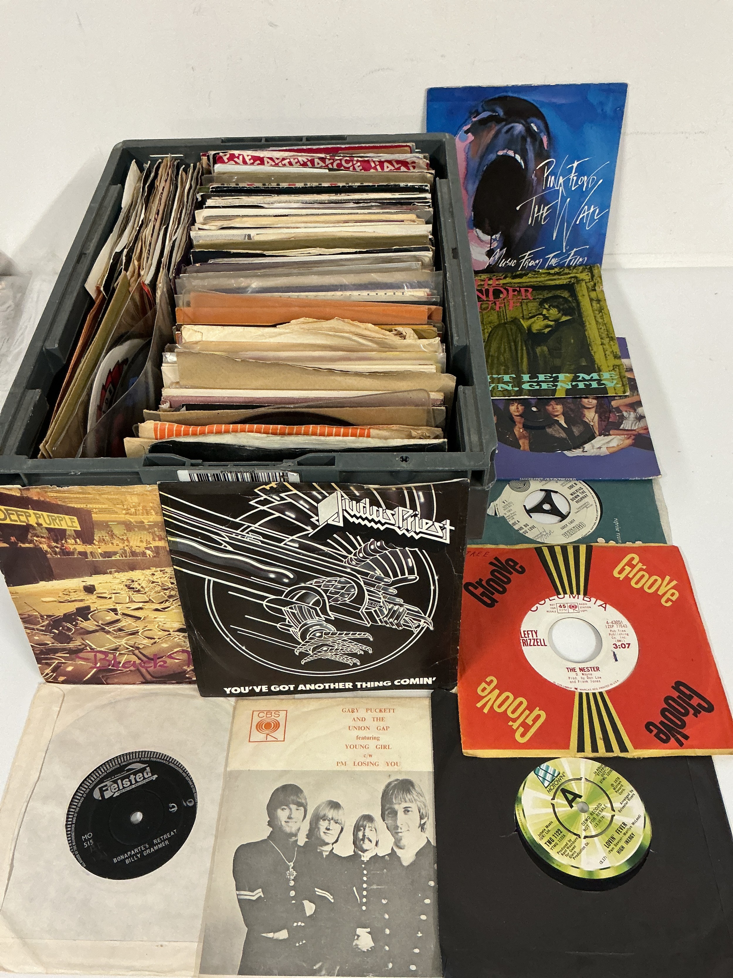 Two records cases of 7" singles by various artists including Billy Fury, Deep Purple, Pink Floyd and many more. Includes demo discs, picture discs and a Winston Churchill multi LP box set.