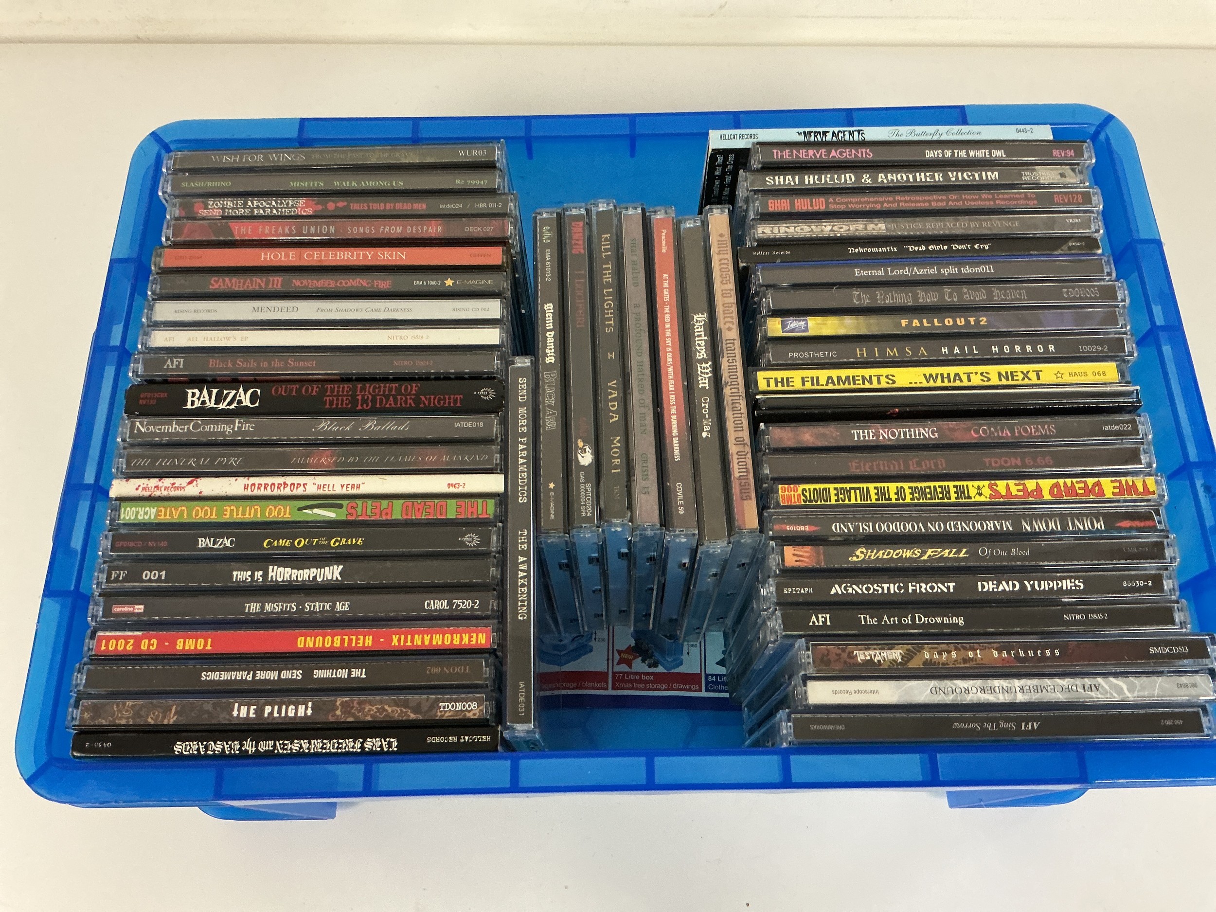 A collection of heavy rock CDs by various artists including Misfits, AFI, Samhain and others.