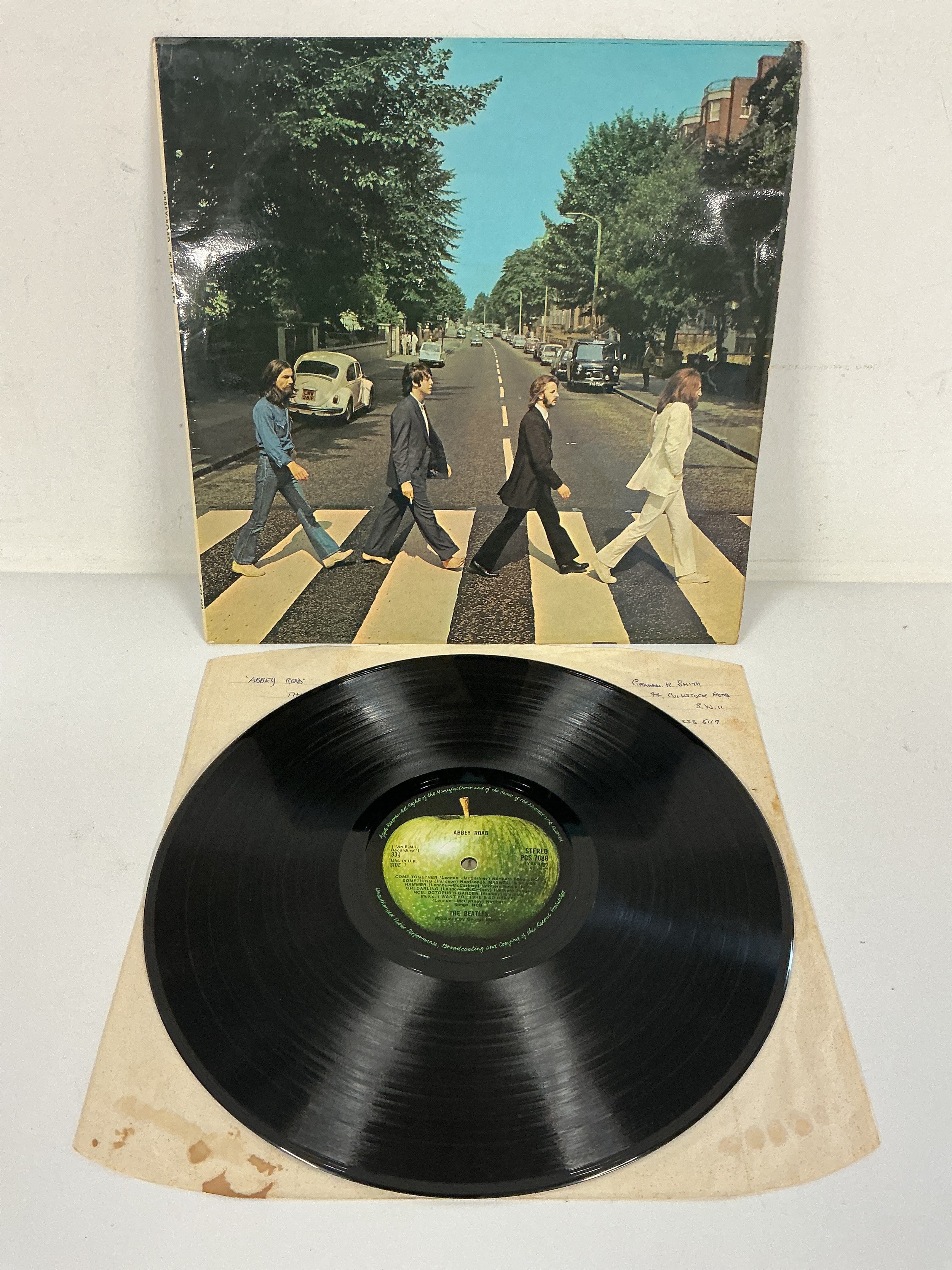 An early UK pressing of Abbey Road with misaligned Apple logo to reverse and no Her Majesty credit. Vinyl EX. Some light surface marks, one tiny feelable scratch on side B.