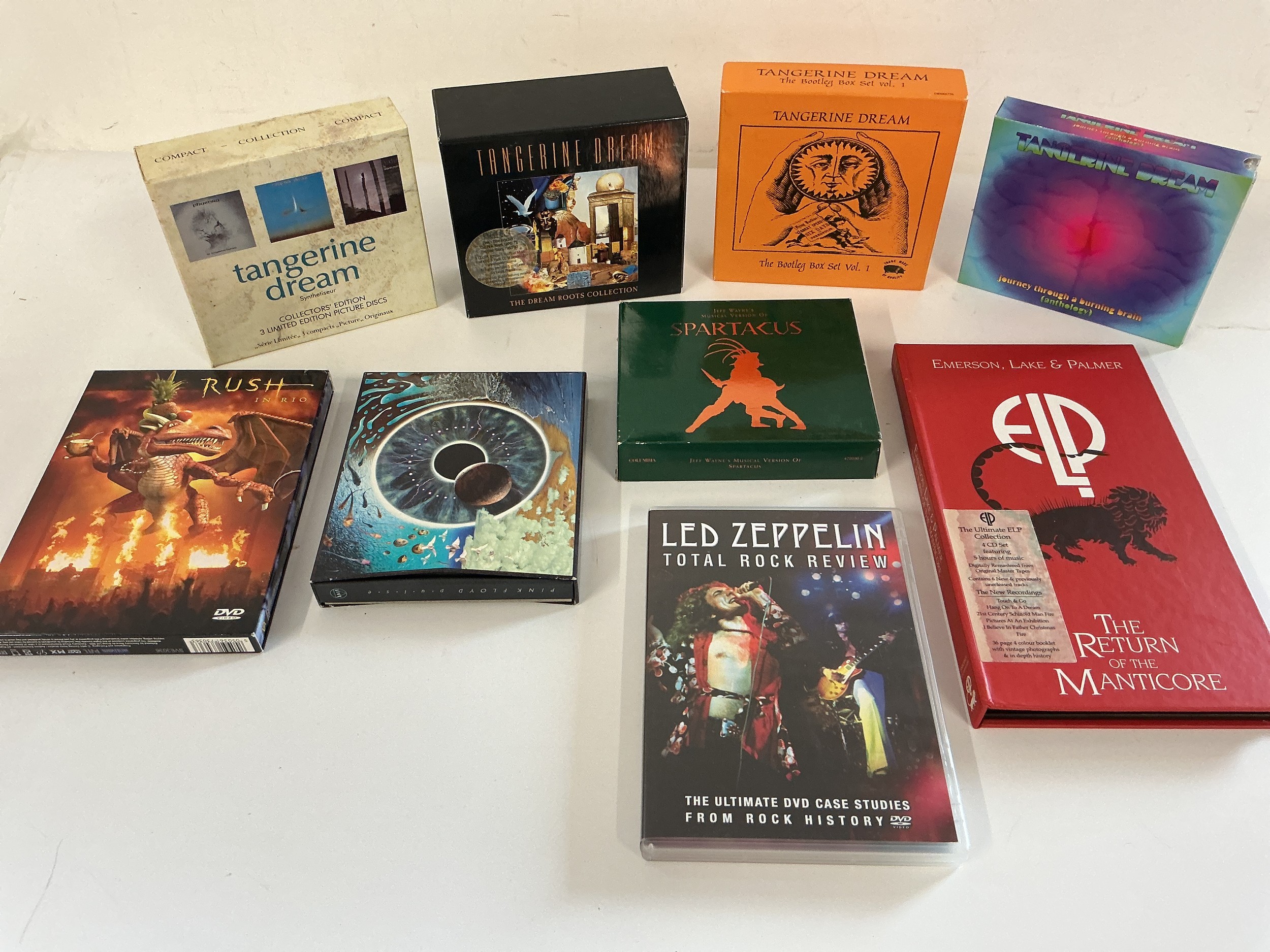 A collection of CD box sets and DVDs by various artists including Tangerine Dream, Pink Floyd, Emerson, Lake & Palmer and others.