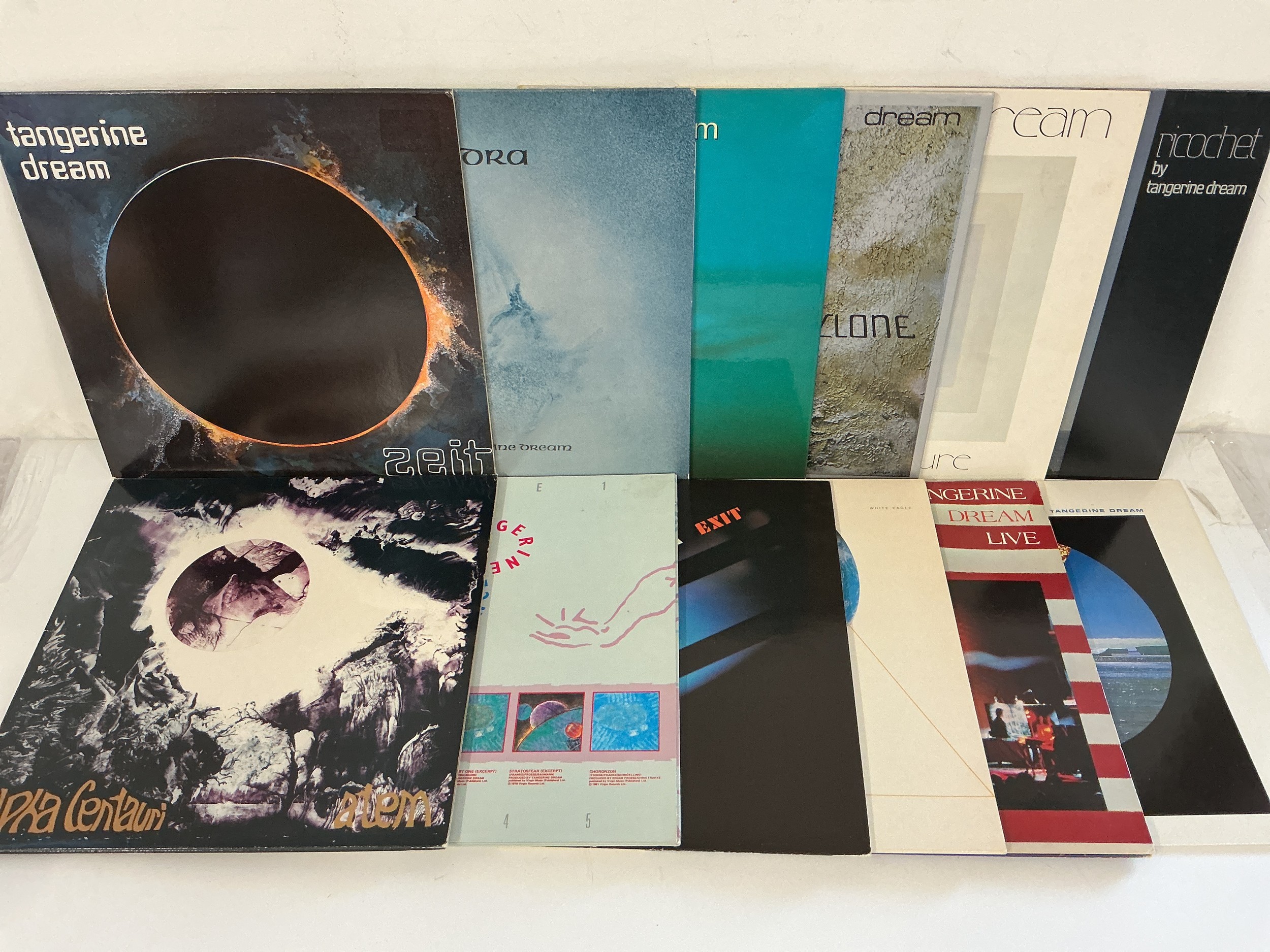 Twelve LPs by Tangerine Dream comprising Ricochet, Phaedra, Alpha Centauri and others.