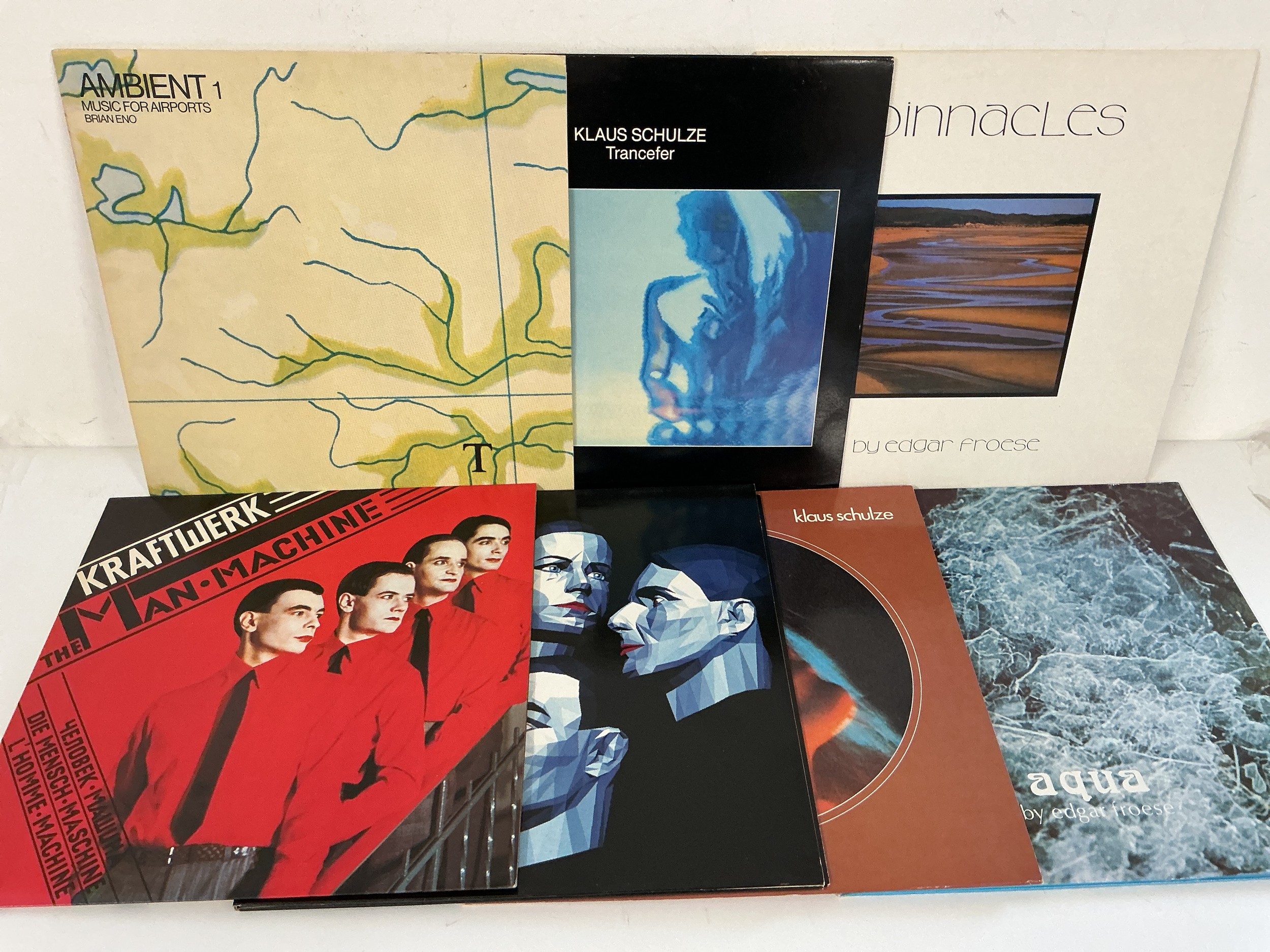 Fourteen krautrock and ambient LPs and a 12" single by Kraftwerk, Edgar Froese, Brian Eno and Klaus Schulze.