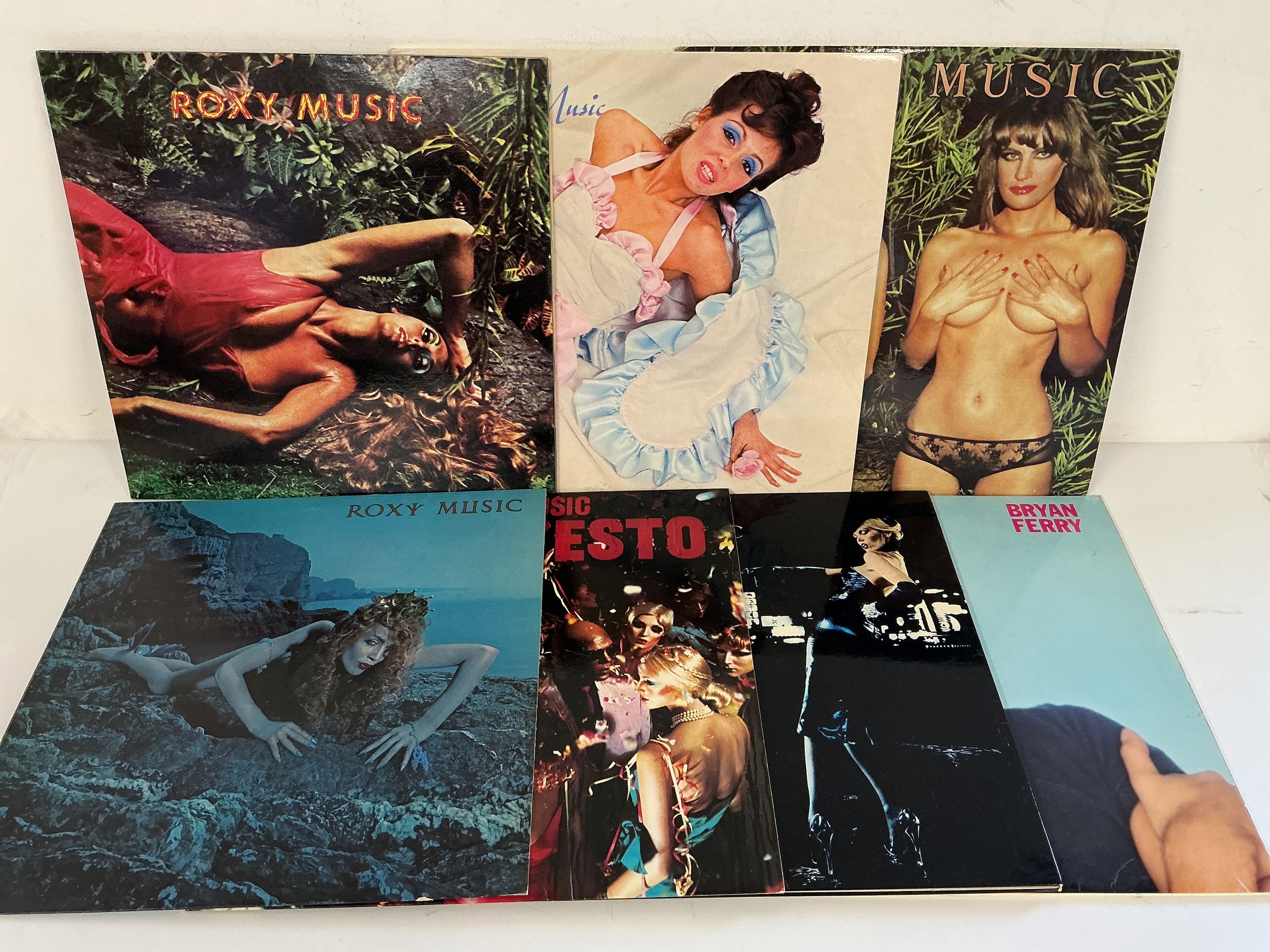 Fourteen Roxy Music and related LPs comprising Stranded, Country Life, Avalon and others.