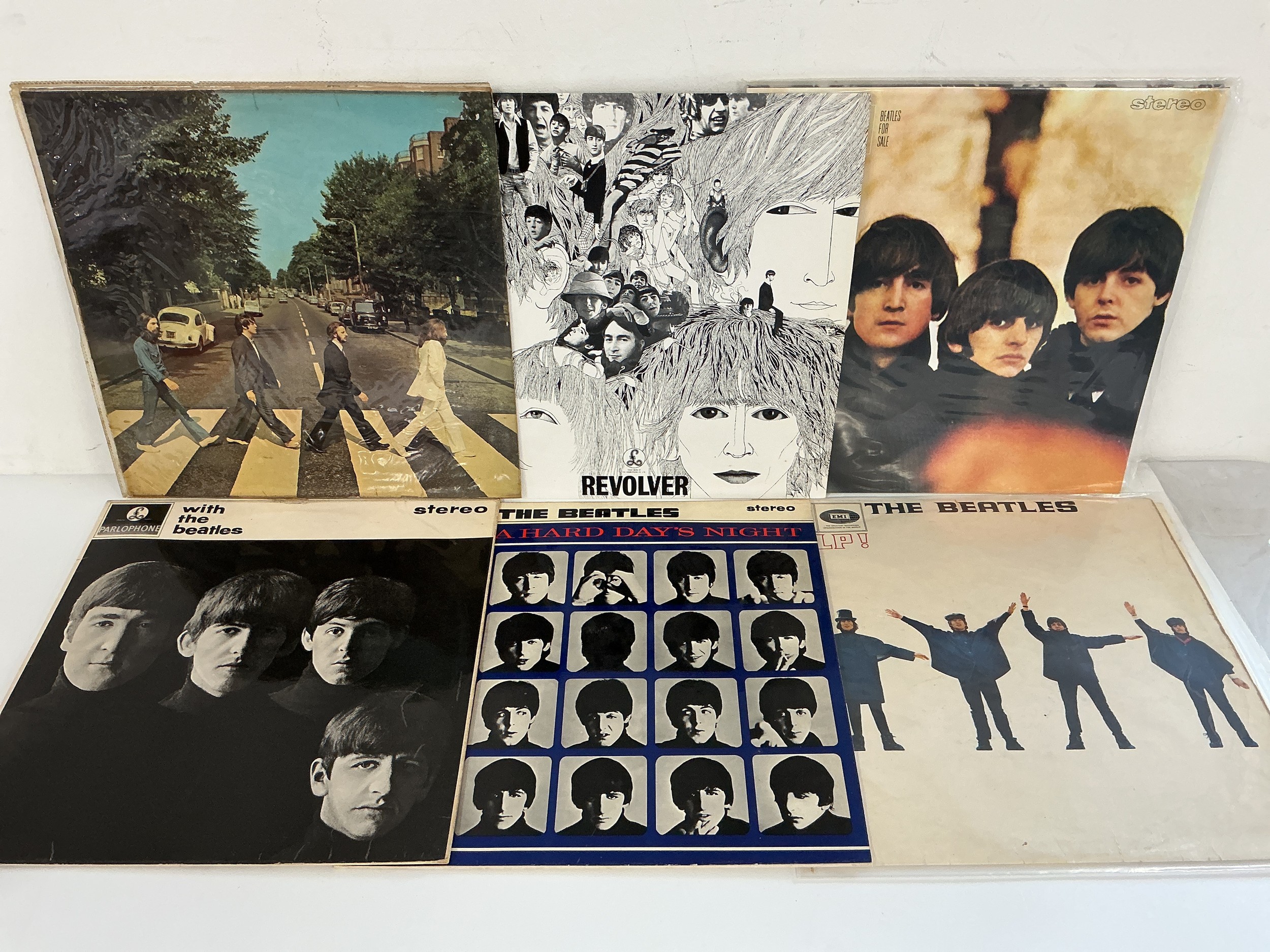 Six Beatles LPs comprising reissues of Revolver, Beatles For Sale and others plus a French pressing of Abbey Road.