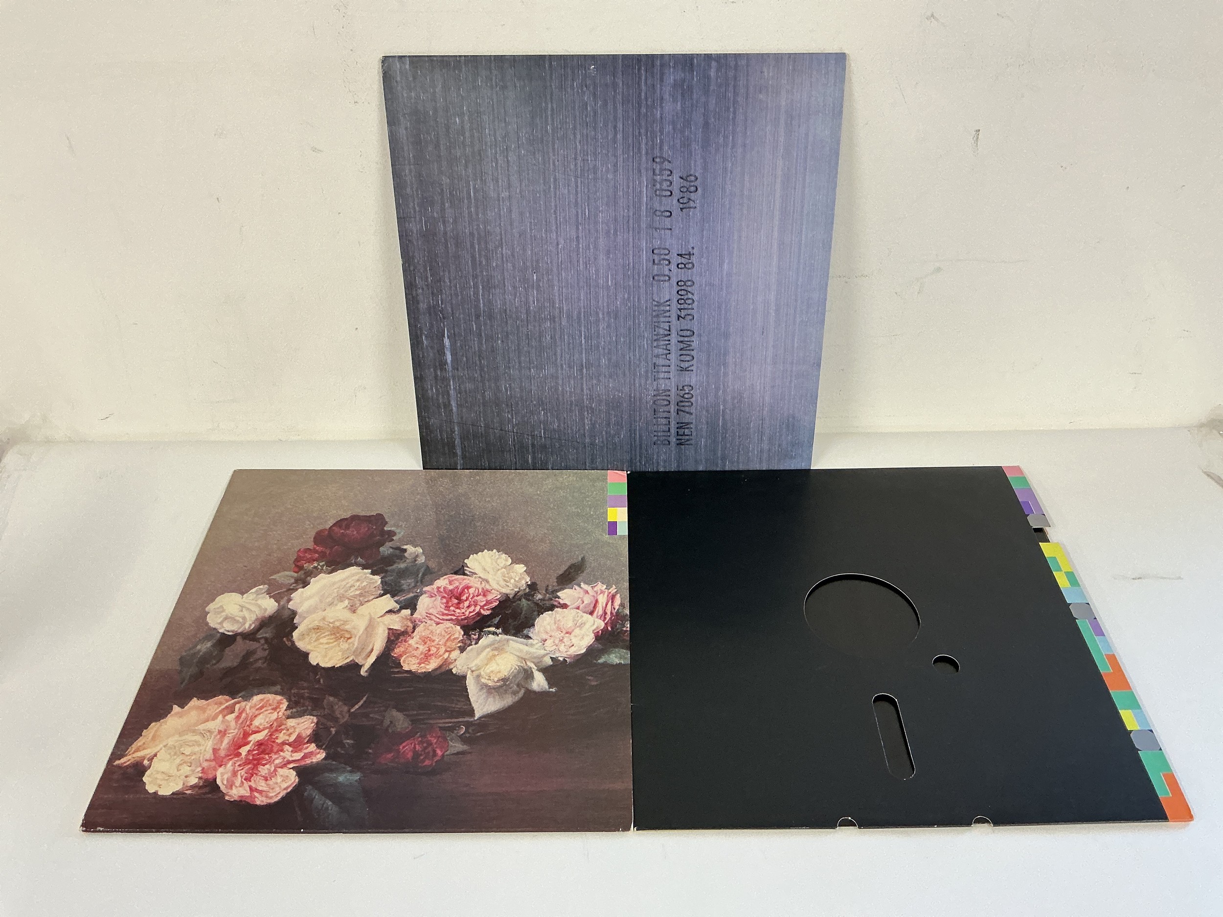 Two New Order LPs and a 12" single comprising Power, Corruption & Lies, Brotherhood and Blue Monday.