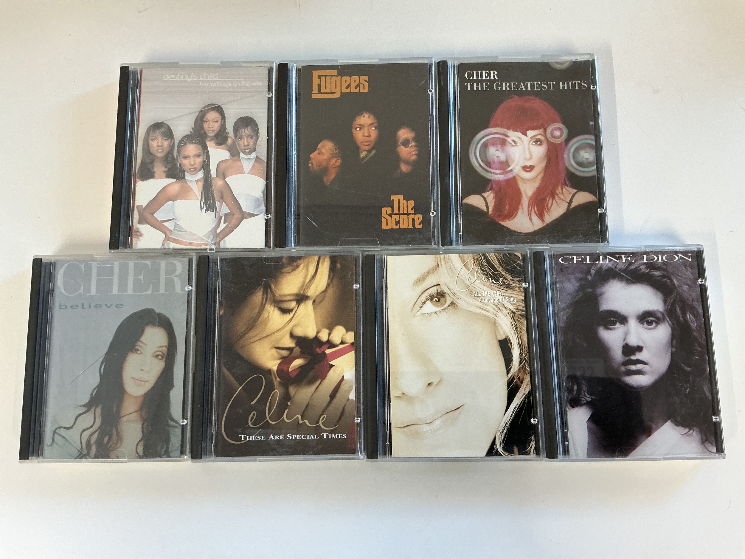 Seven minidiscs by various artists comprising The Fugees, Cher, Celine Dion and Destiny's Child.
