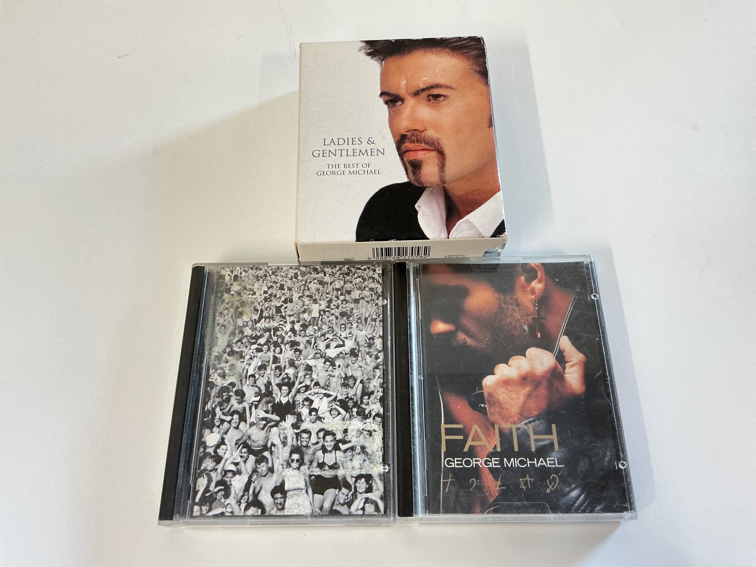 Three George Michael minidiscs comprising Faith, Listen Without Prejudice and Ladies & Gentlemen.