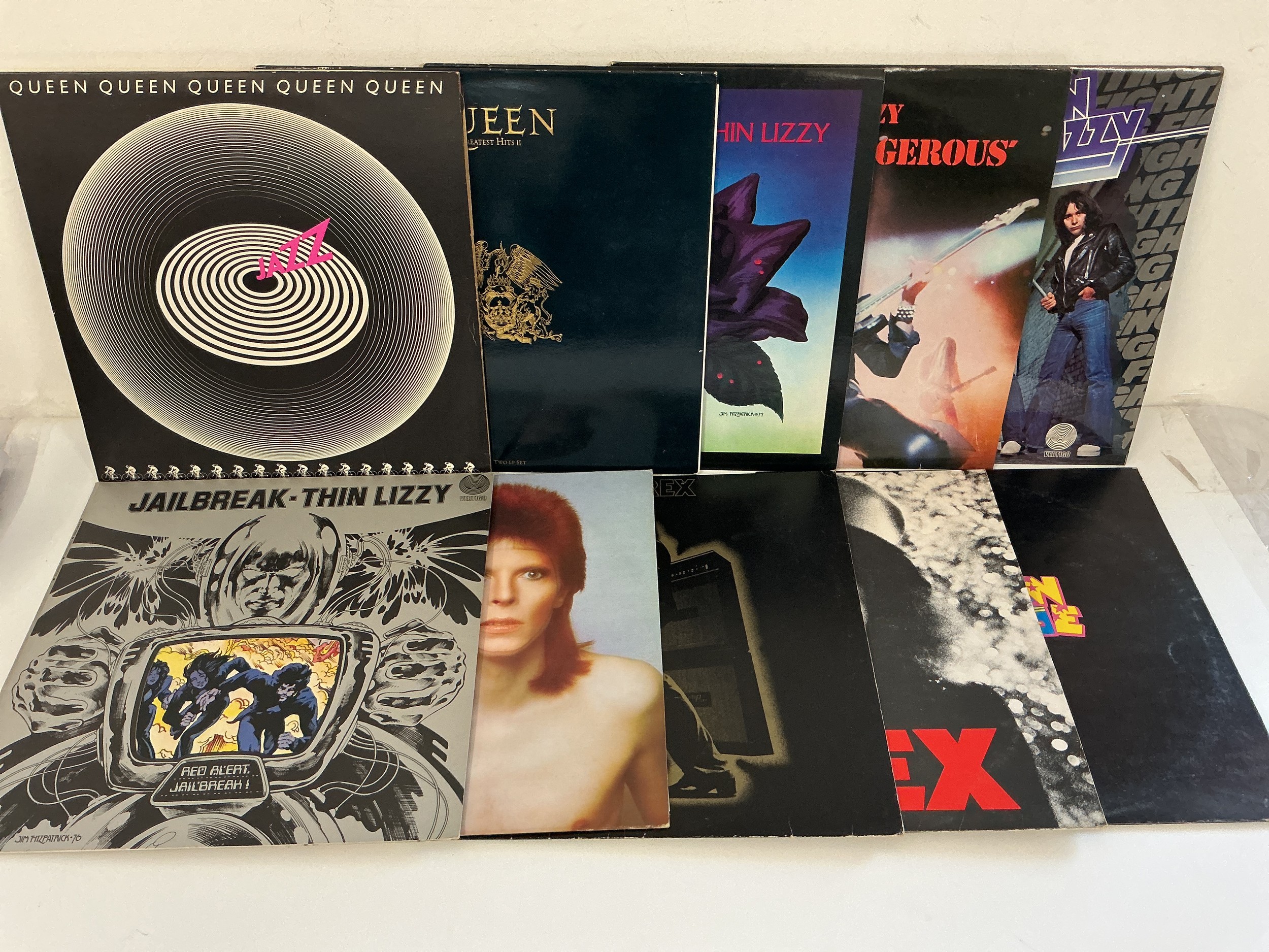 Ten rock LPs by Queen, David Bowie, T Rex and Thin Lizzy.