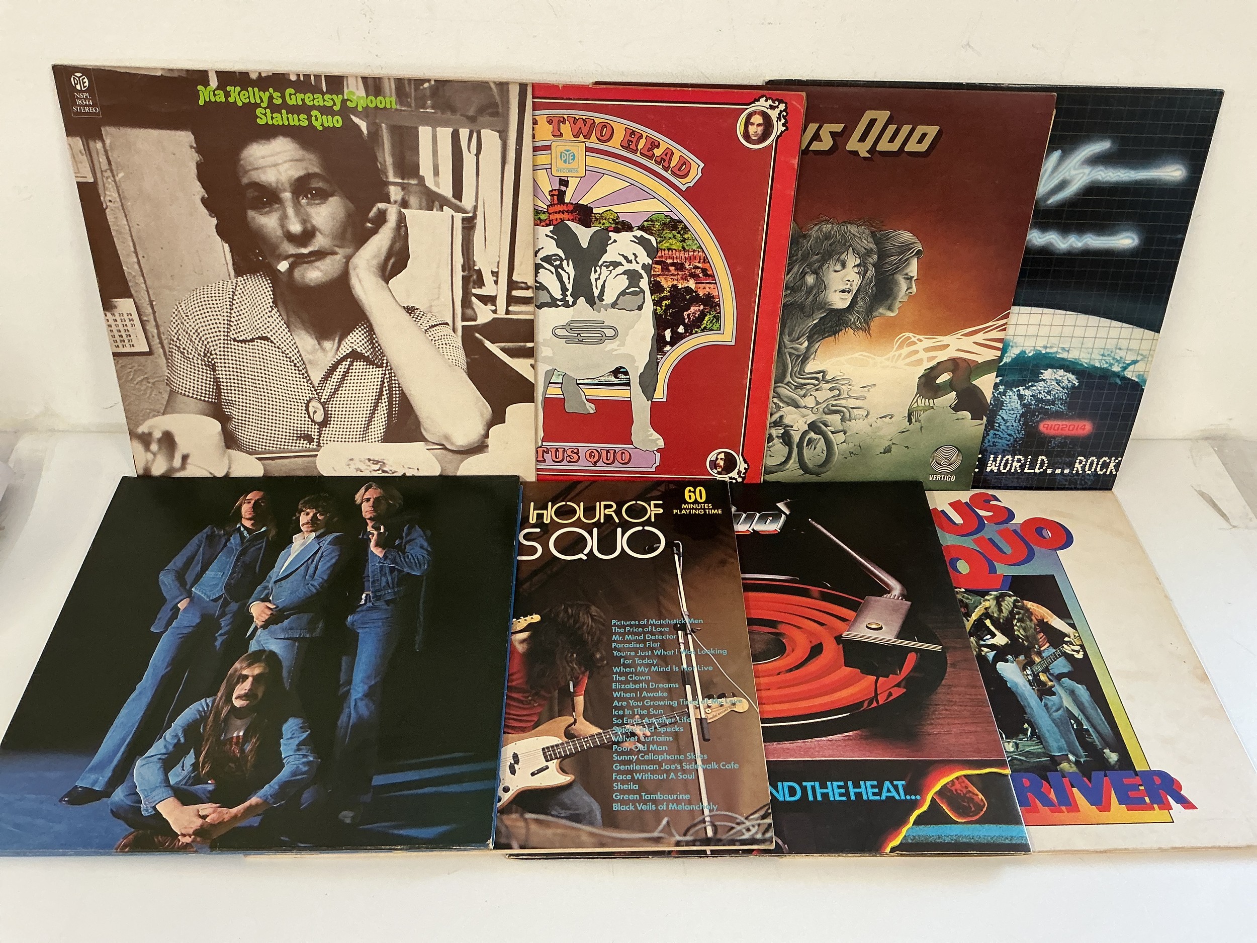 Eight Status Quo LPs comprising Piledriver, Ma Kelly's Greasy Spoon and others.