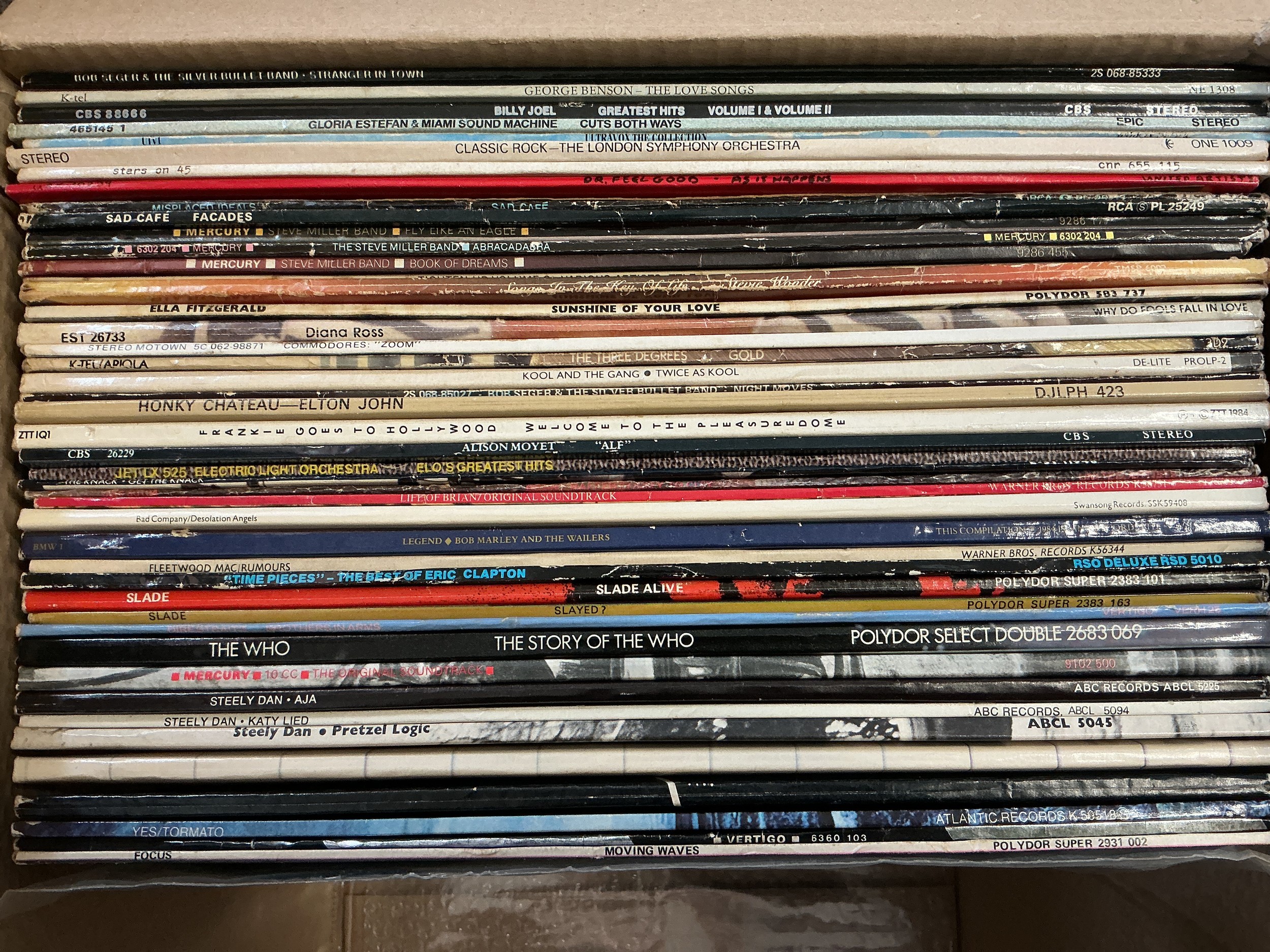 A collection of LPs by various artists including Pink Floyd, The Who, Steely Dan and others.