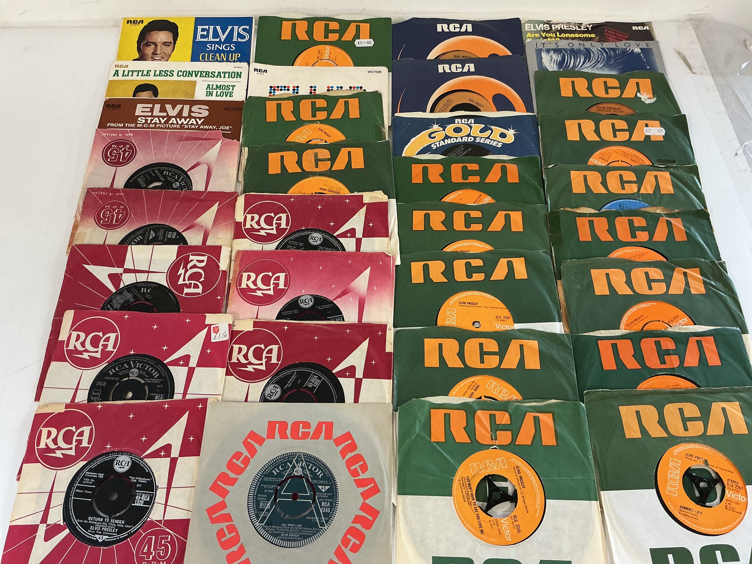An extensive collection of Elvis Presley 7" singles and EPs including a demo disc of All That I Am b/w Spinout.