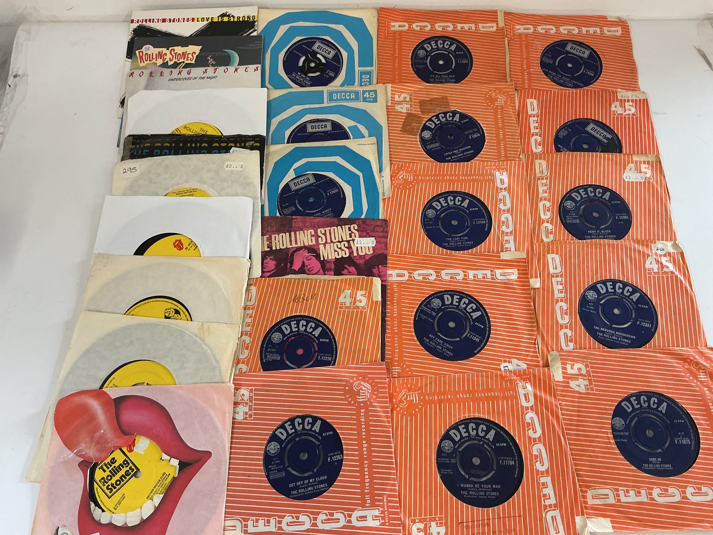 A collection of Rolling Stones 7" singles including Come On, Not Fade Away, We Love You and others.