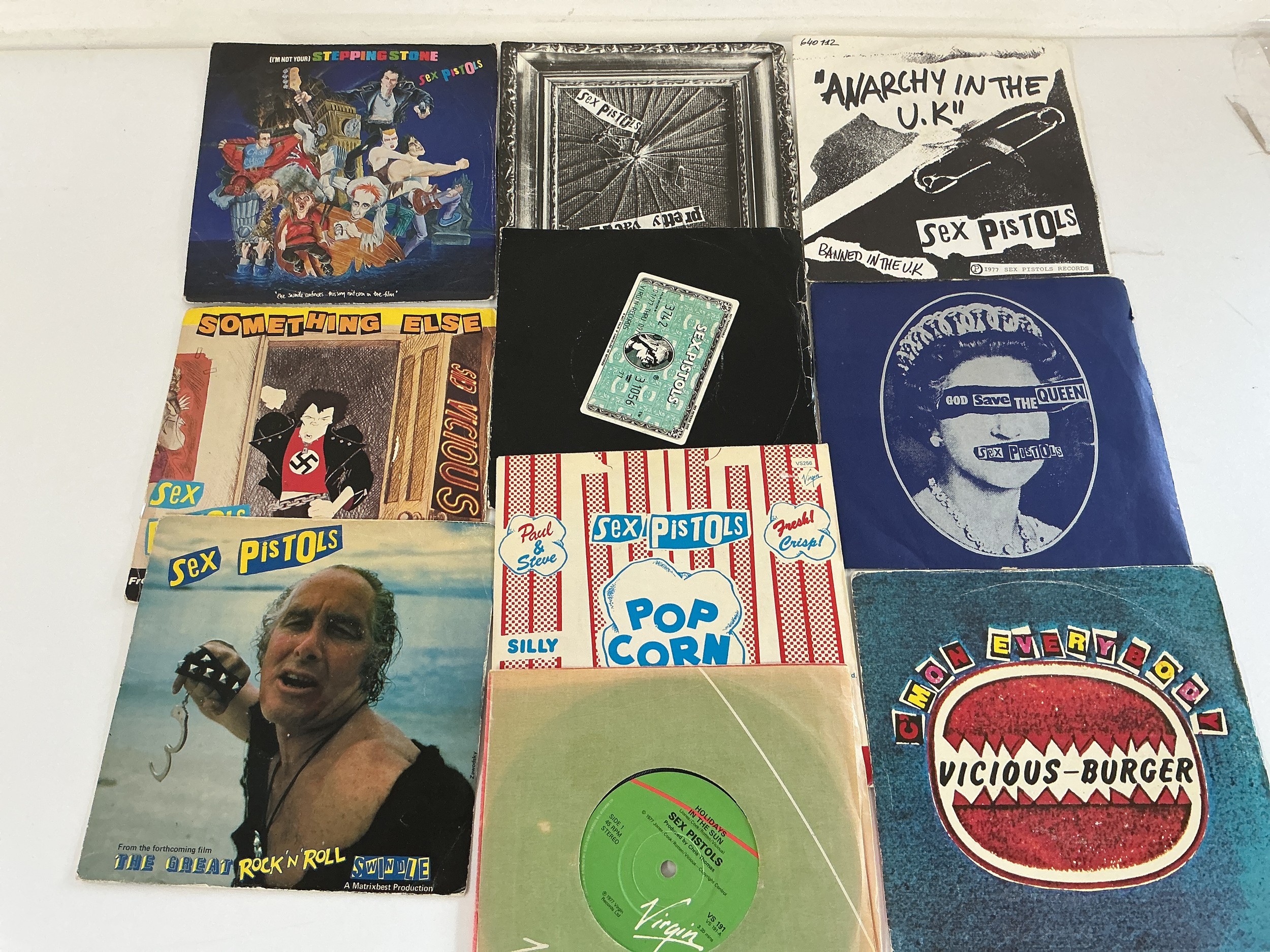 Two Sex Pistols LPs and ten 7" singles.