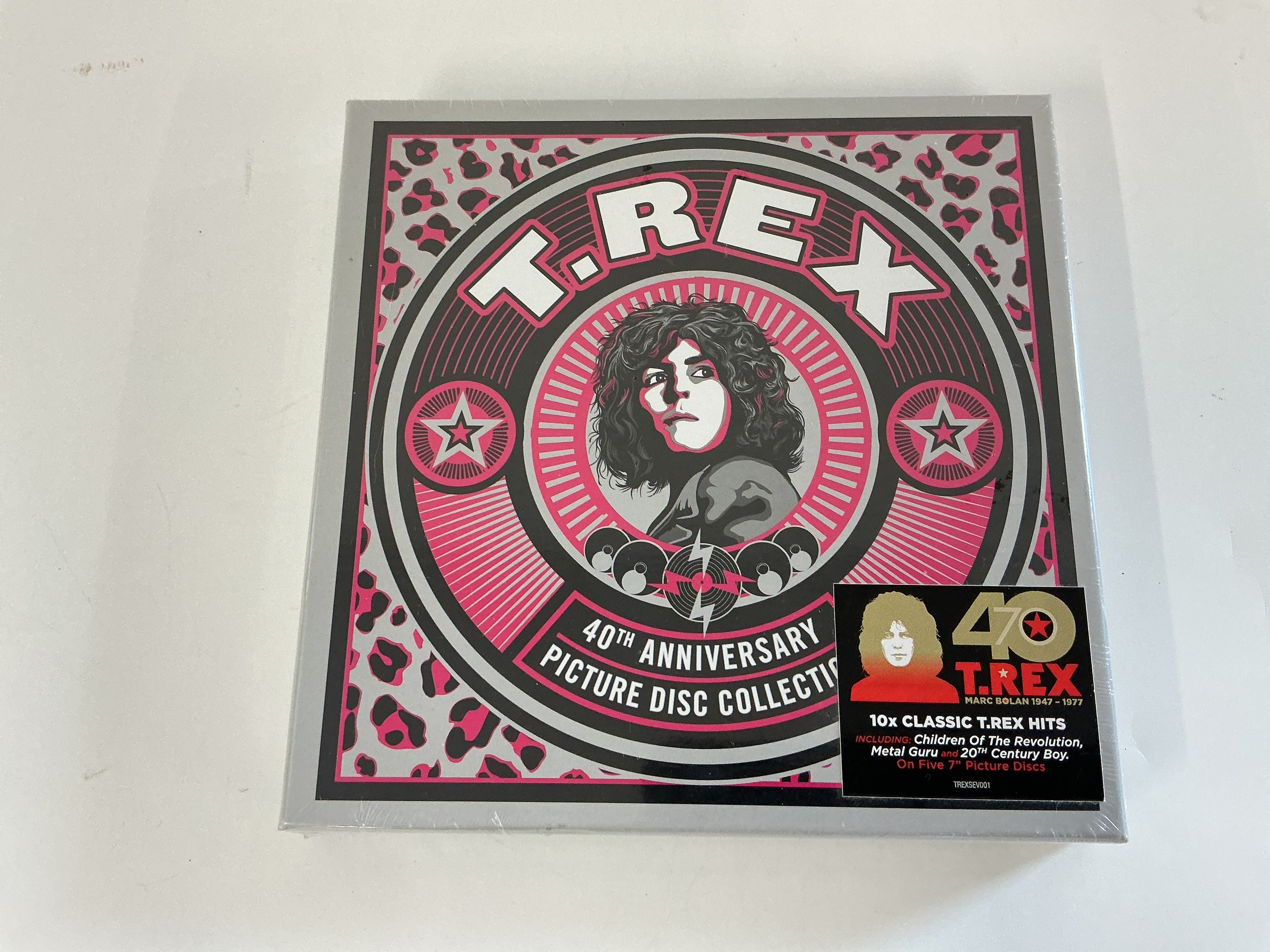A sealed T Rex 40th anniversary 7" picture disc collection.
