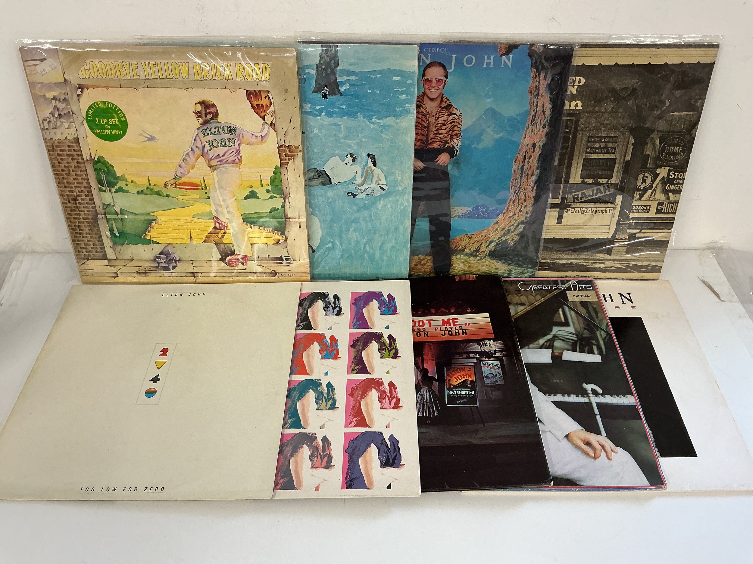 Nine Elton John LPs comprising a yellow vinyl 2LP Goodbye Yellow Brick Road, Tumbleweed Connection, Blue Moves and others.