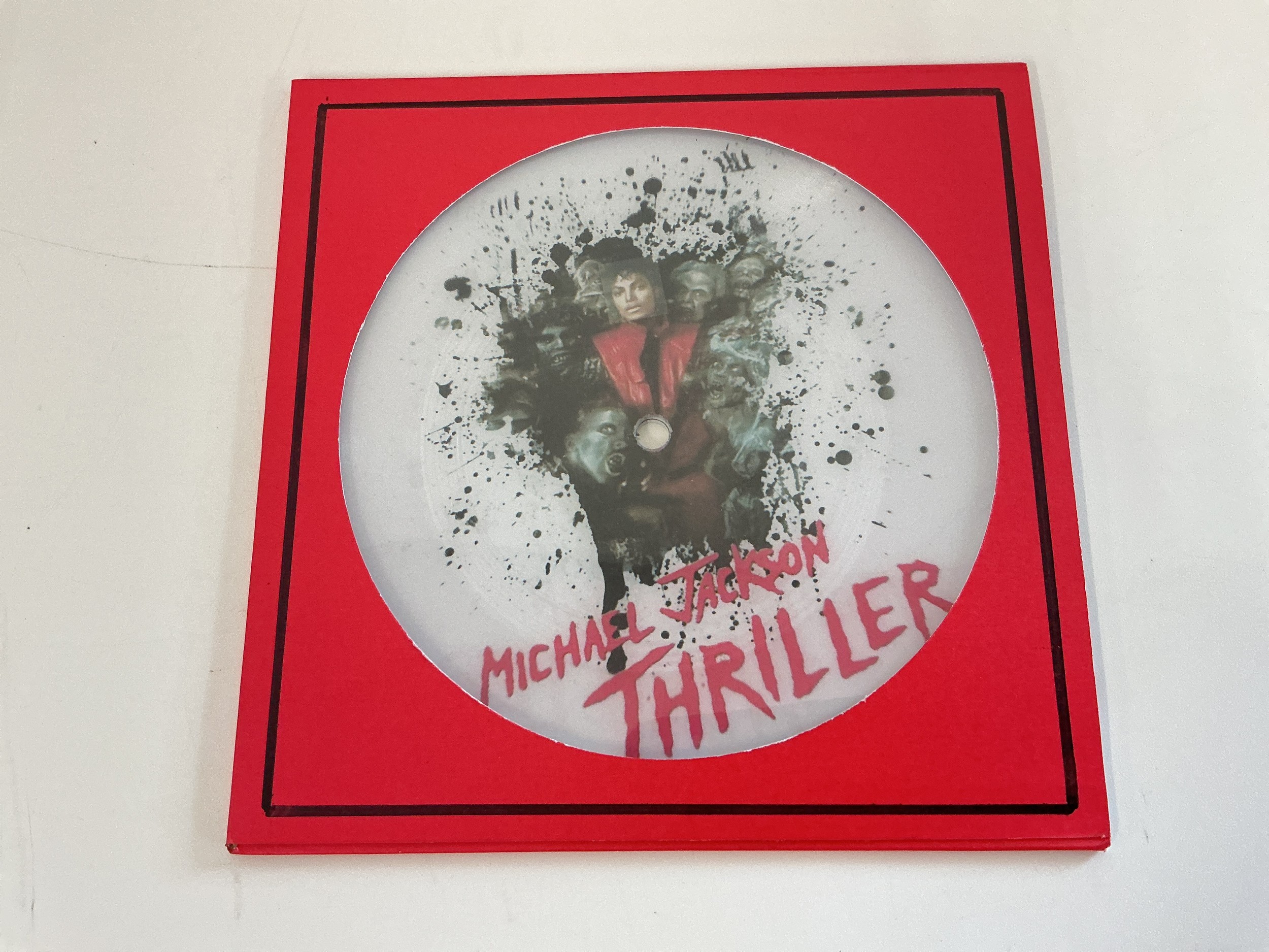 A unique Michael Jackson 7" picture disc of Thriller made as a one off at the pressing plant by a member of staff.