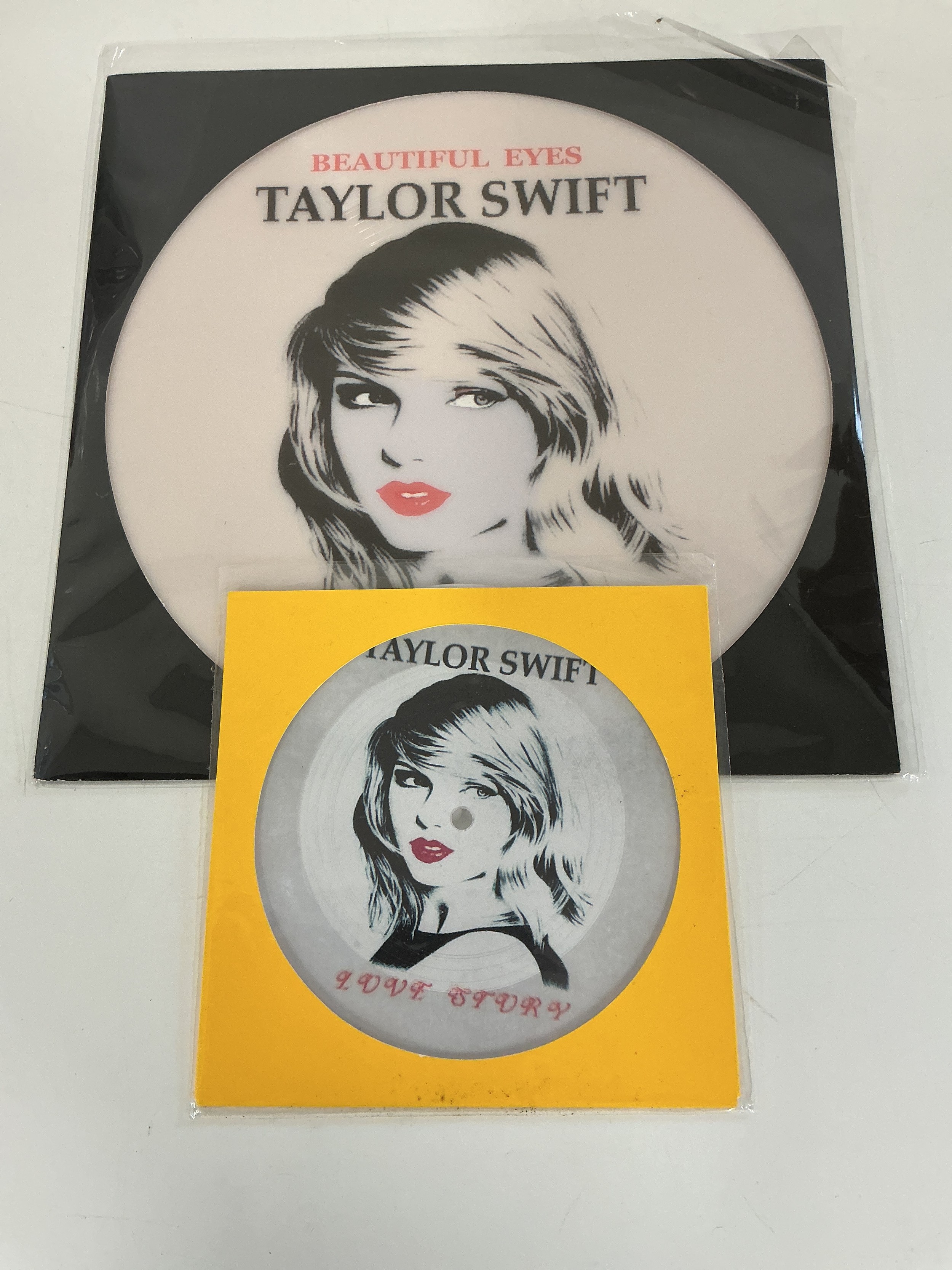 A unique Taylor Swift 12" single picture disc and 7" picture disc.