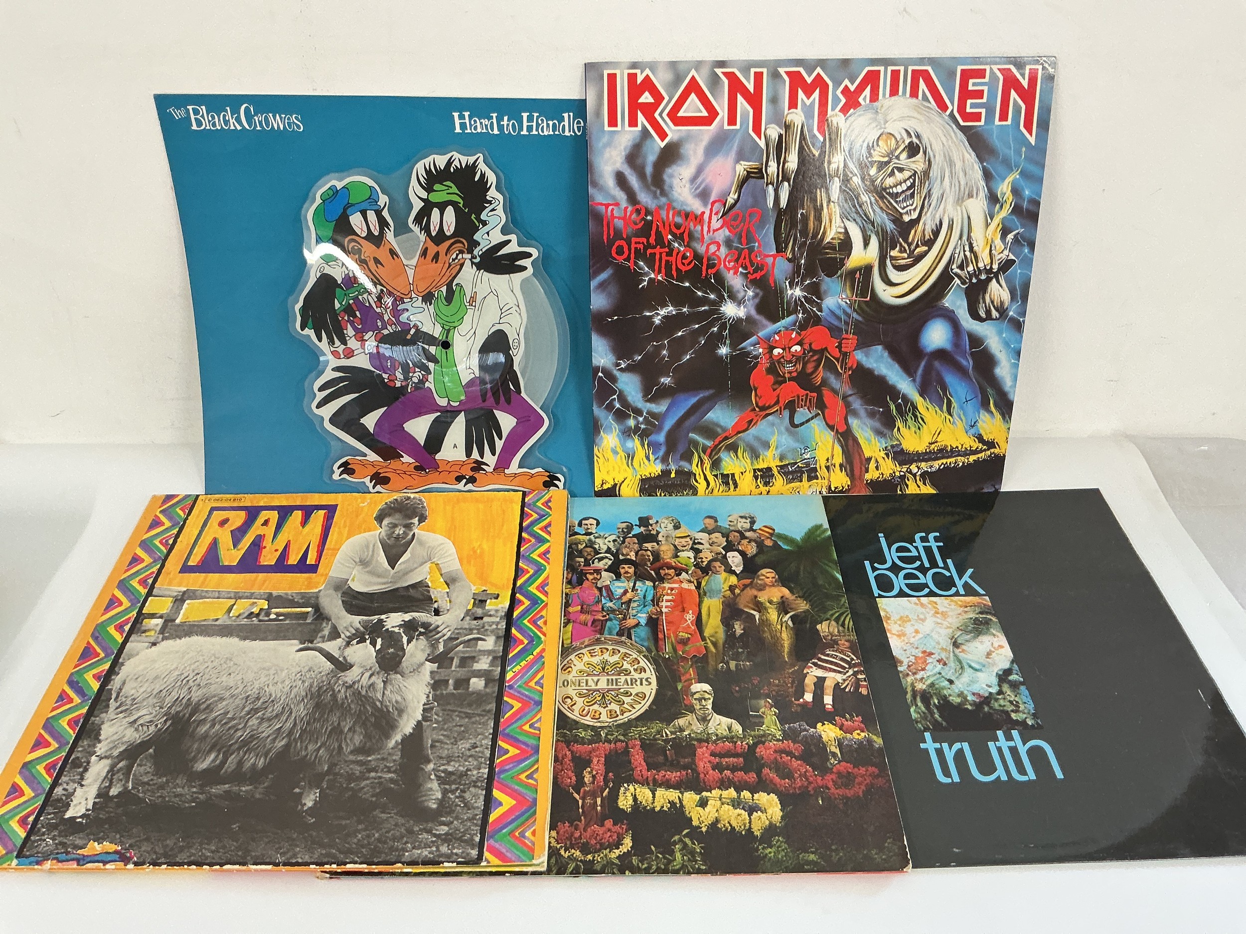 Early UK pressings of LPs by The Beatles, Jeff Beck, Iron Maiden and Paul McCartney plus a 7" Black Crowes picture disc of Hard To Handle.
