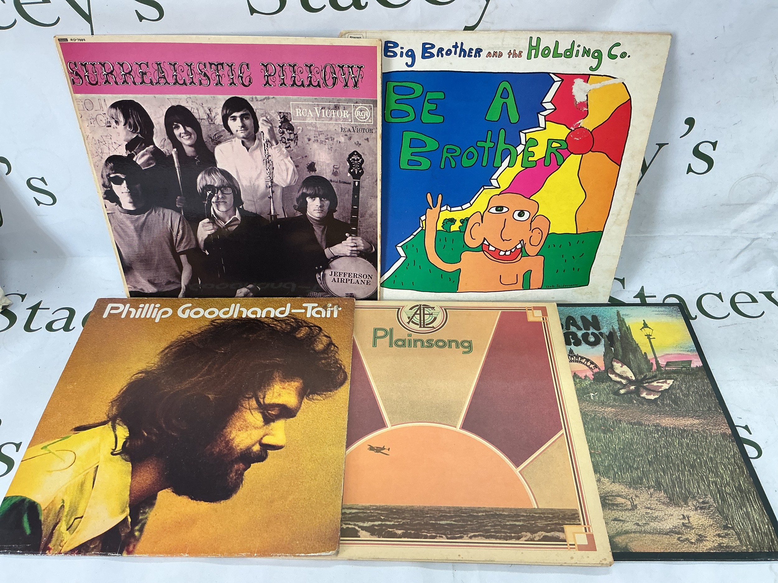 Five LPs comprising a first UK pressing of Surrealistic Pillow by Jefferson Airplane plus albums by Big Brother & The Holding Company, Plainsong and others.
