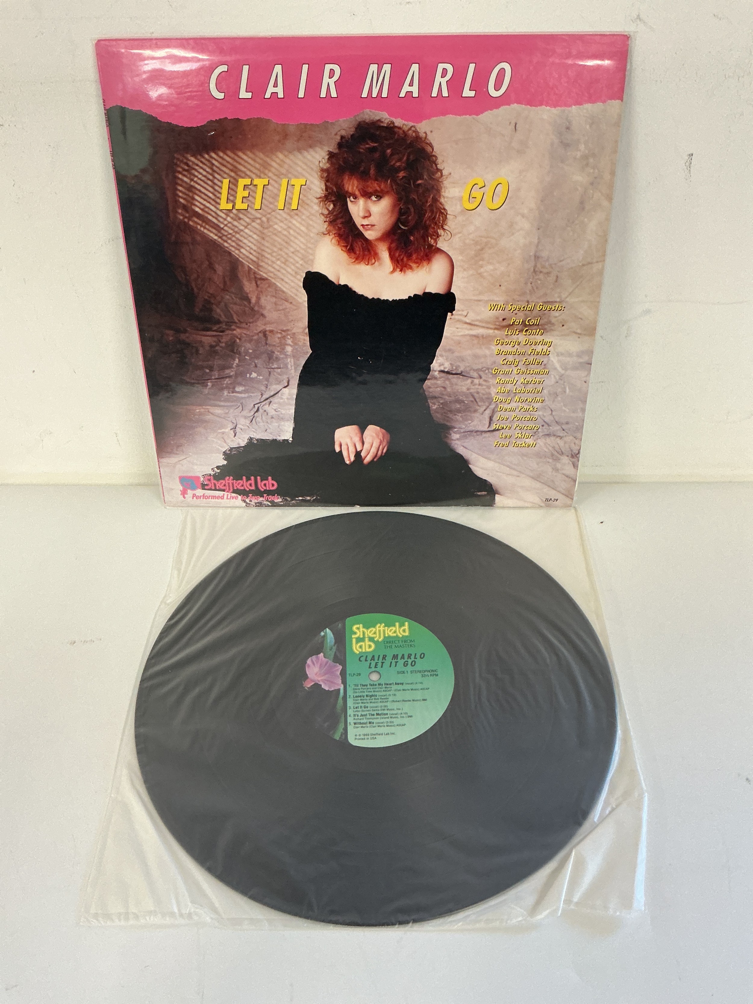 A very rare Clair Marlo - Let It Go LP on the Sheffield Lab label. EX/EX.
