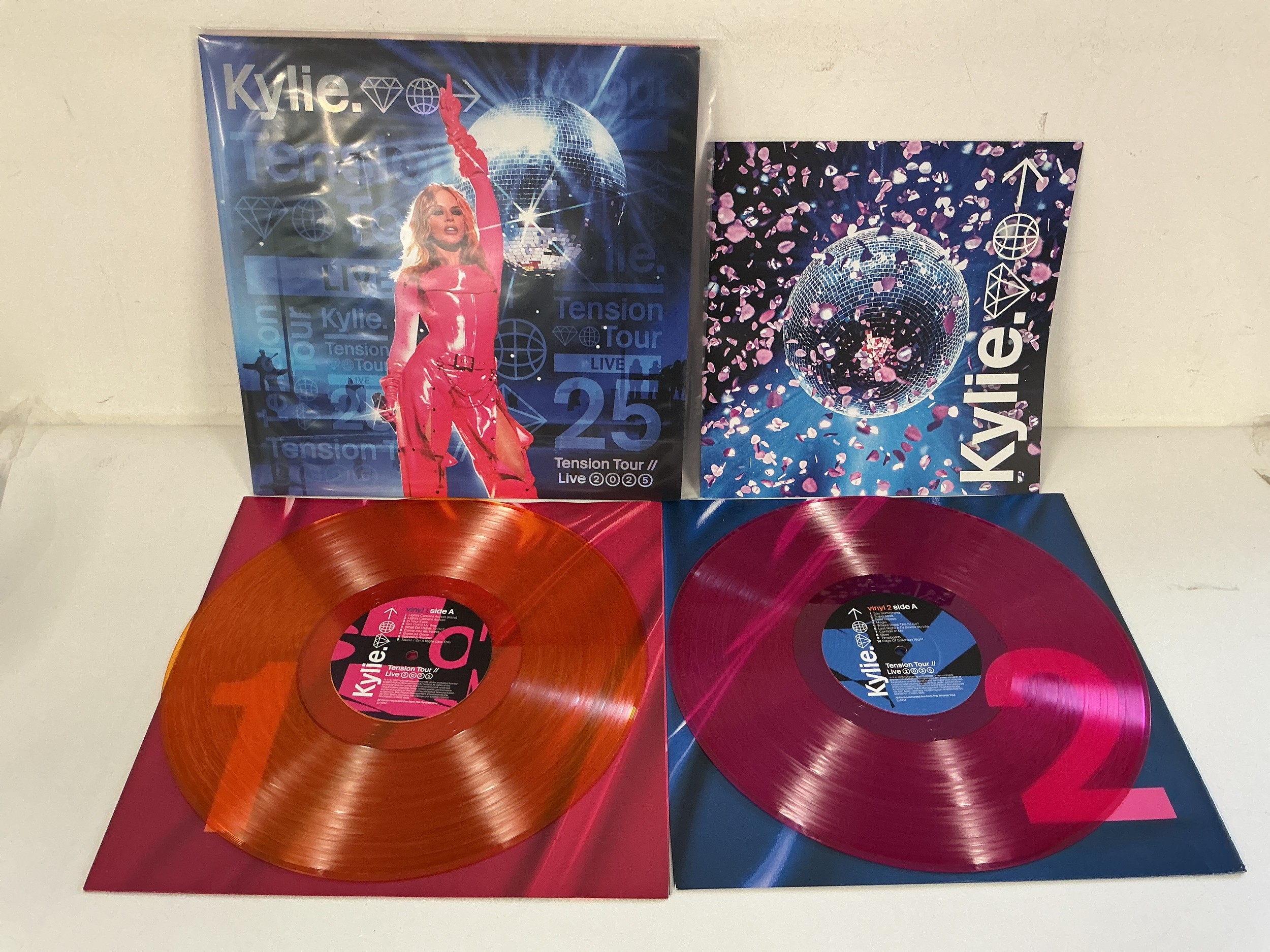 A Kylie Minogue - Tension Tour Live 2025 2LP on coloured vinyl and complete with booklet insert. EX/EX.