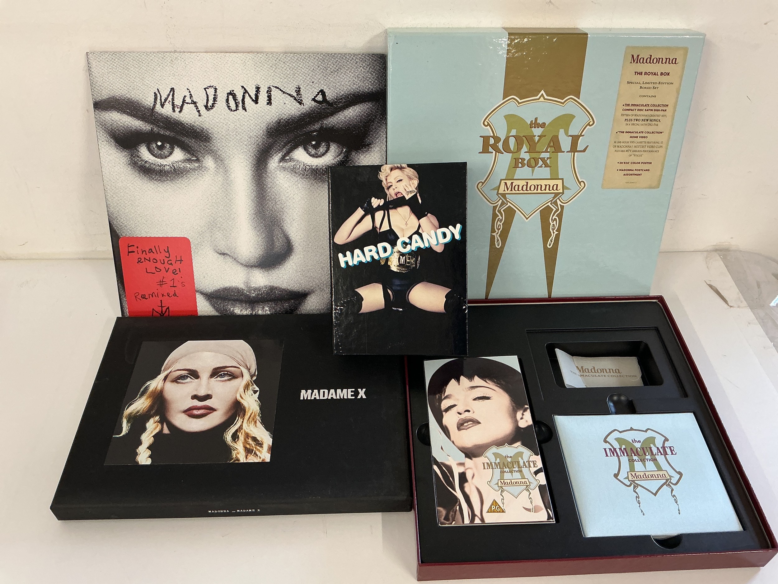 A Madonna Royal Box CD/VHS box set, missing insert, a Madame X vinyl/CD/cassette box set, a Hard Candy CD box set complete with inserts and a 180g 2LP Finally Enough Love.