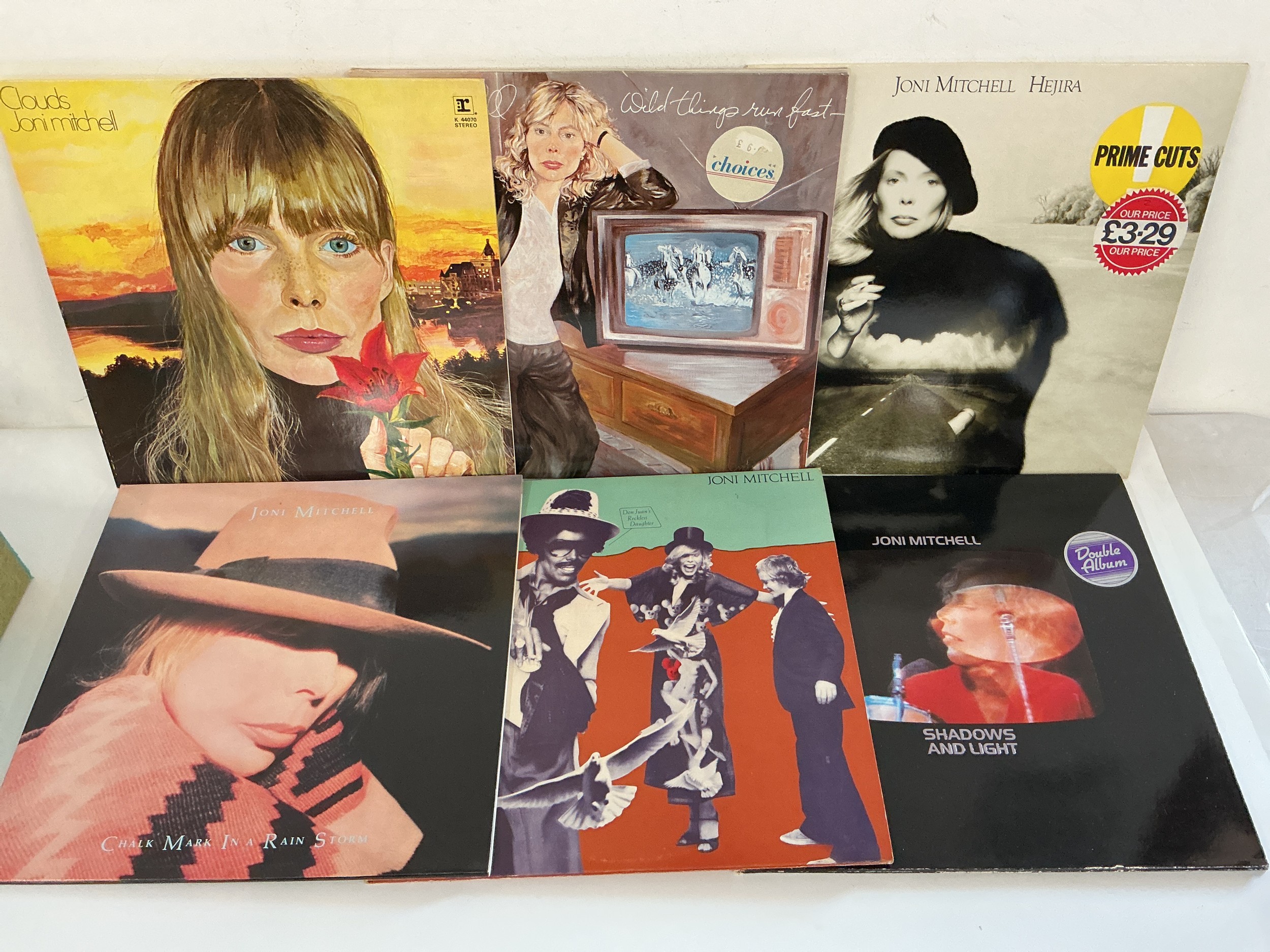 Six Joni Mitchell LPs comprising Clouds, Hejira, Shadows And Light and others.