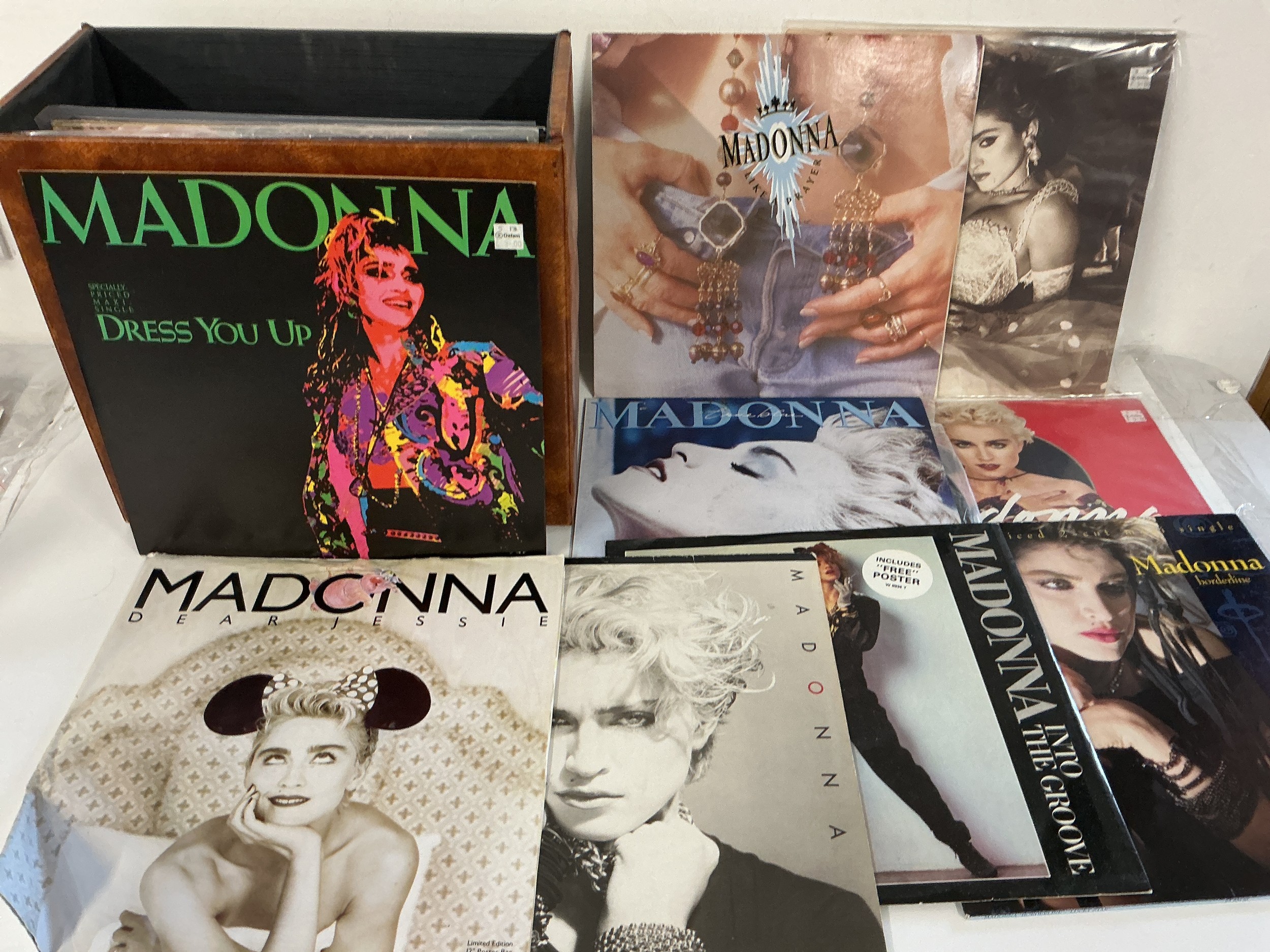 A record case of Madonna 12" singles including Dress You Up, Borderline, Dear Jessie and others.