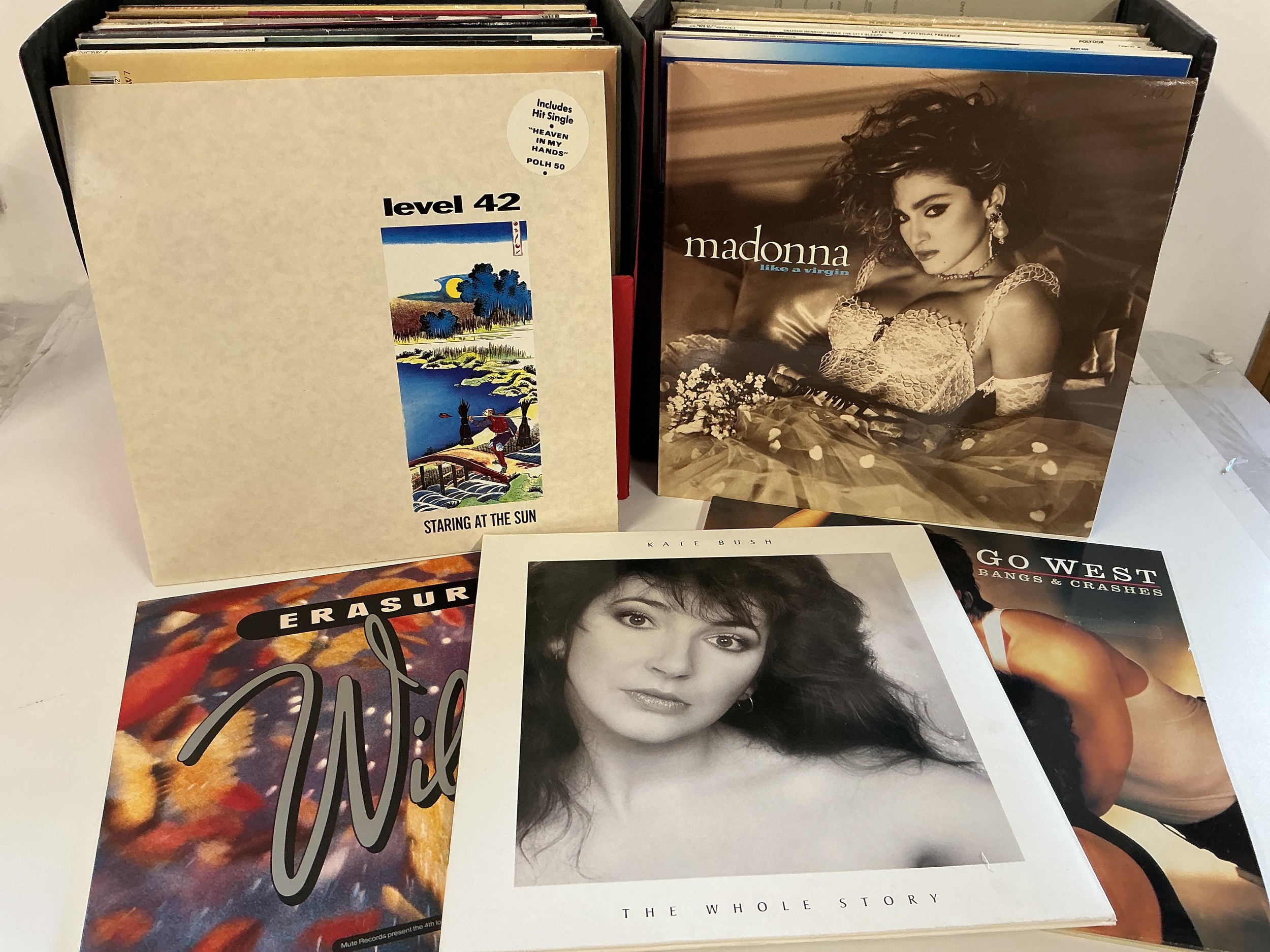 Two record cases of LPs and 12" singles by various artists including Kate Bush, Level 42, Madonna and others.