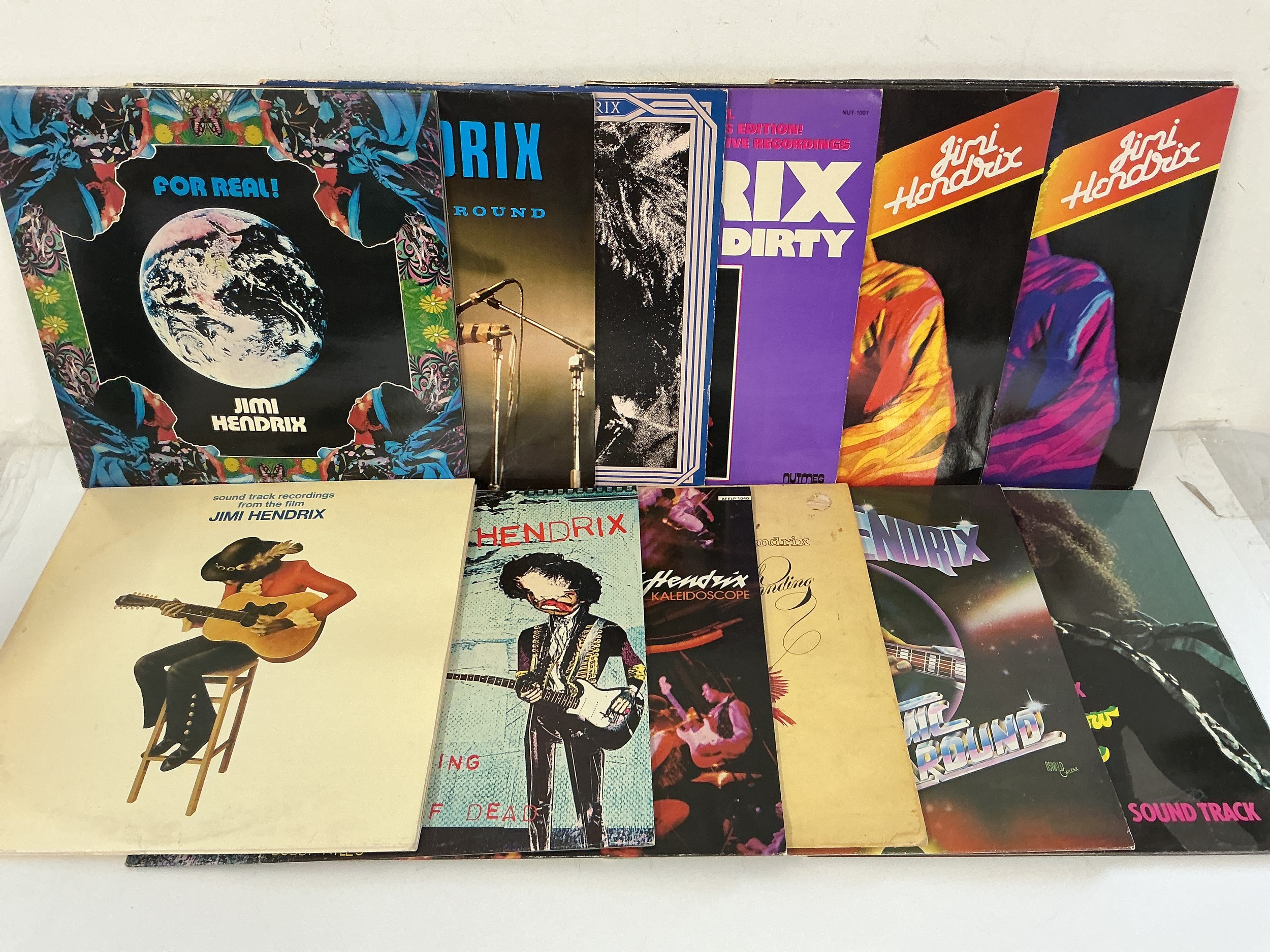 Twelve Jimi Hendrix LPs comprising Crash Landing, For Real, Rainbow Bridge and others.