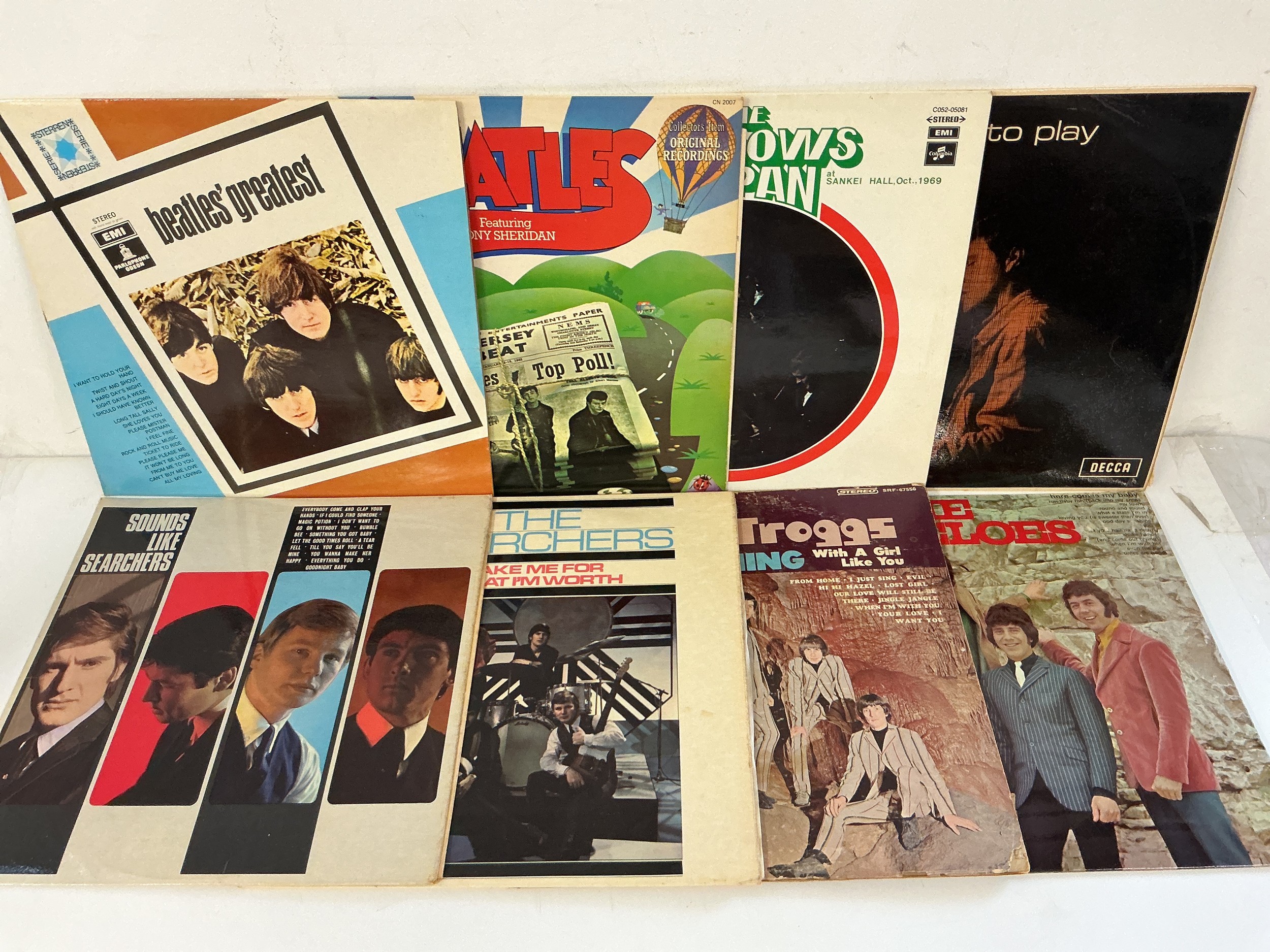 Sixteen 1960s pop and beat group LPs by various artists including The Beatles, The Searchers, The Tremeloes and others.