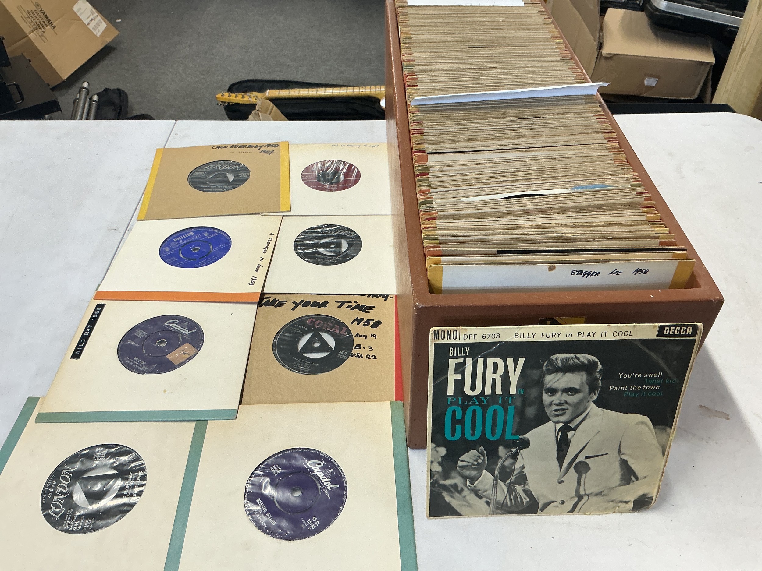 A long box of 7" singles and EPs comprising mainly rock n roll artists including Billy Fury, Marty Wilde, Gene Vincent and many more.