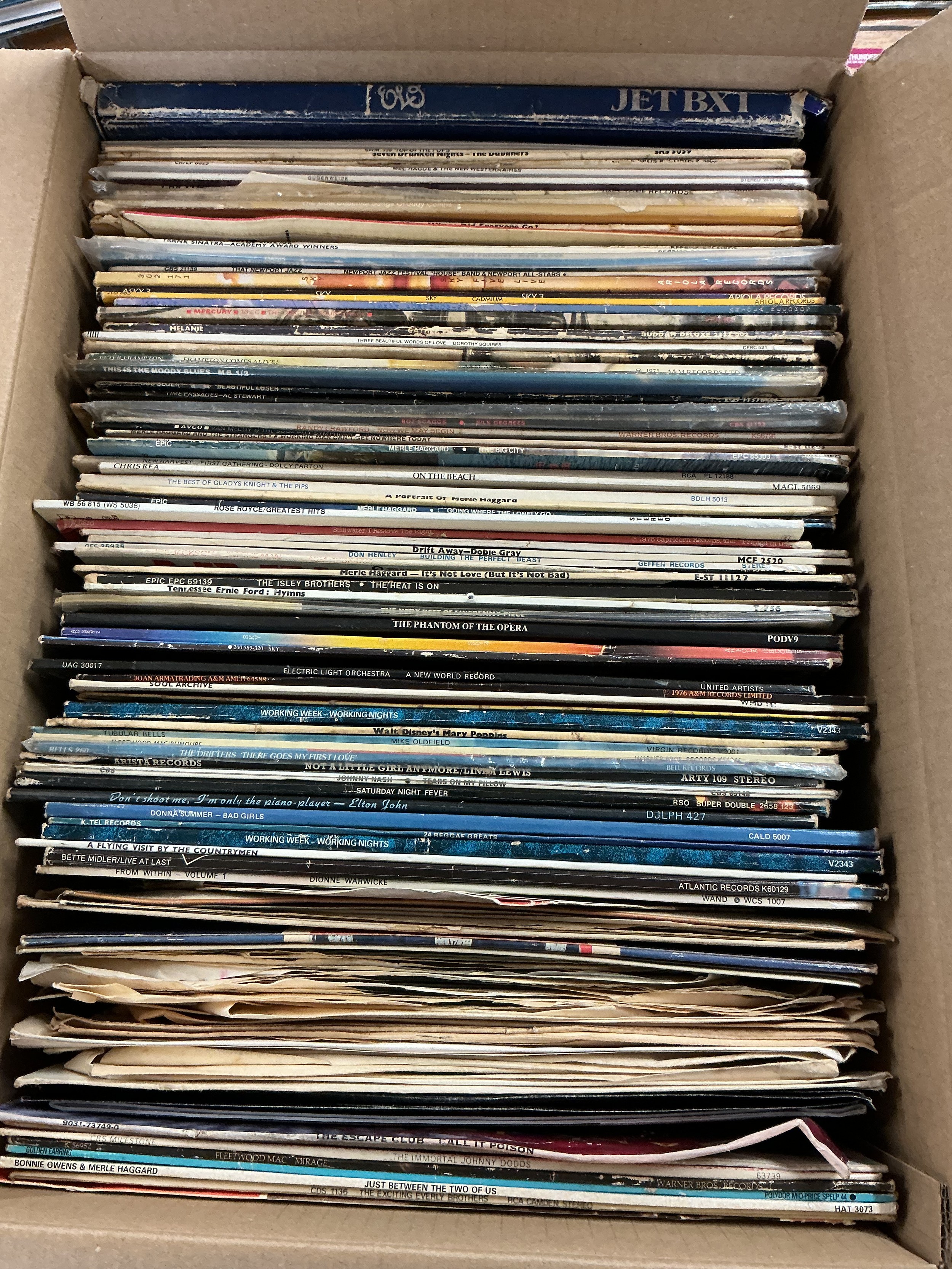A record case and three boxes of LPs by various artists including The Beatles, ELO, Fleetwood Mac and many more.