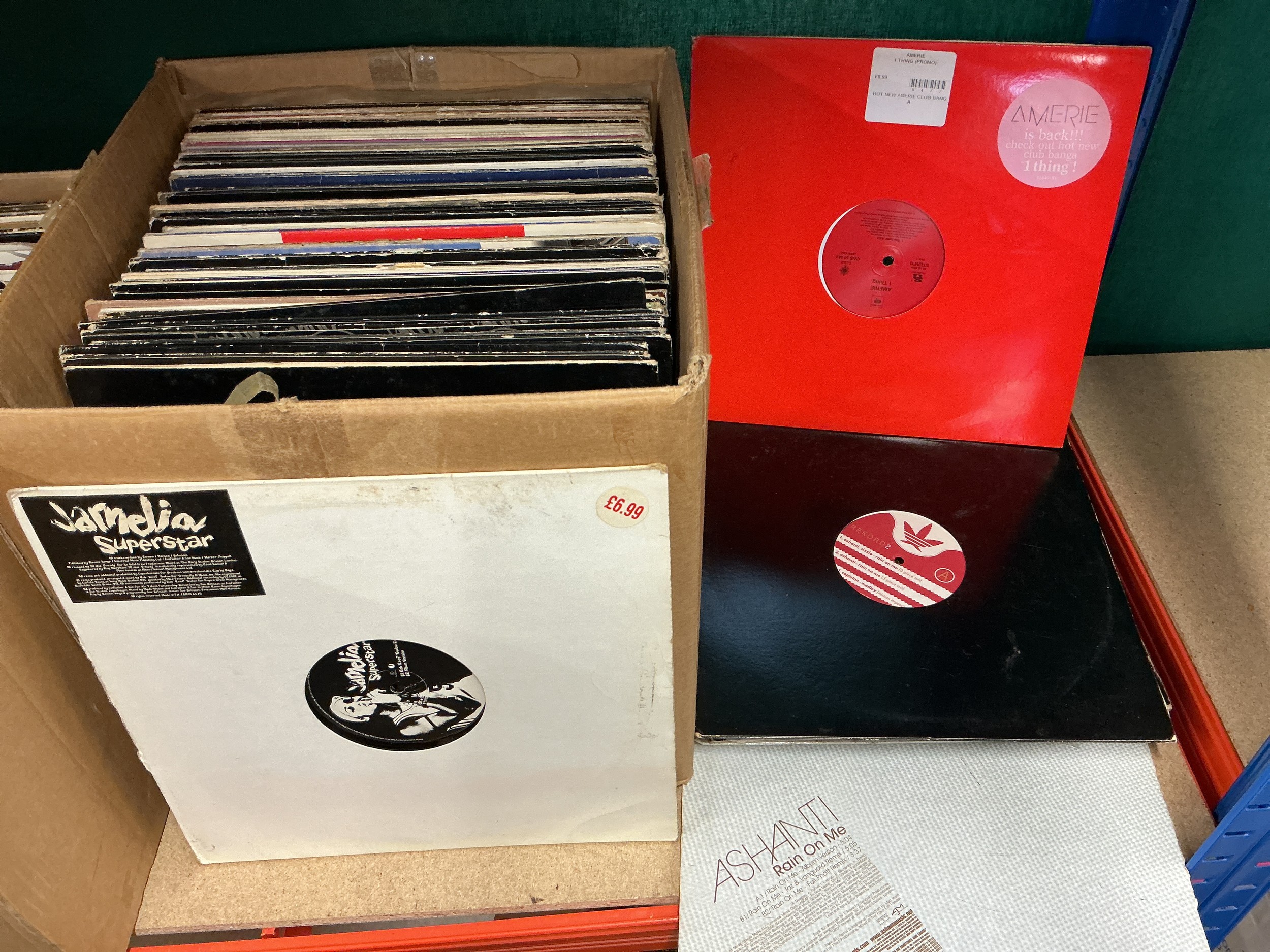A box of hip hop, house and RnB LPs and 12" singles including white labels and promos.