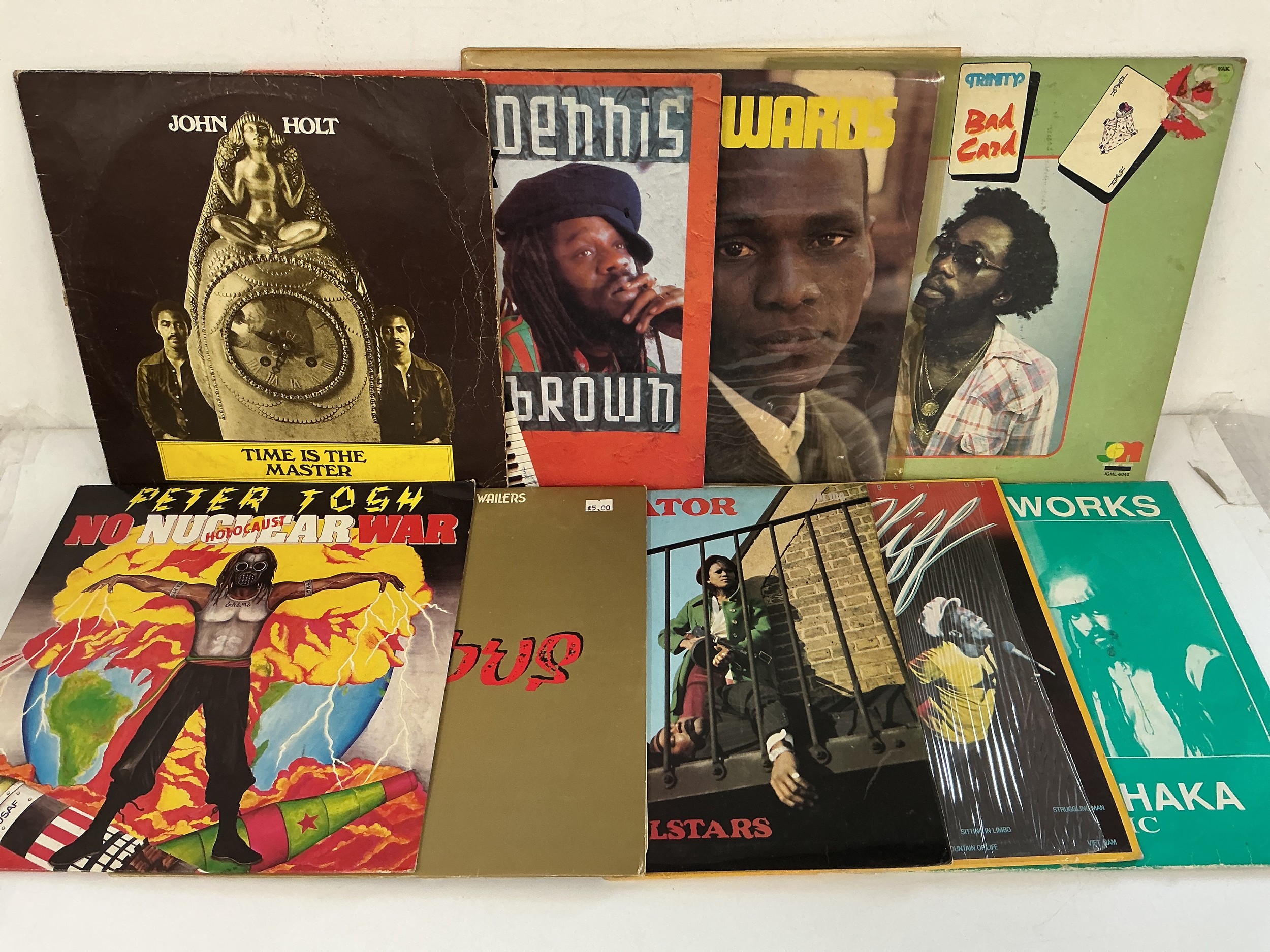 Eighteen reggae LPs and 12" singles by various artists including Bob Marley, Peter Tosh, Aswad and others.