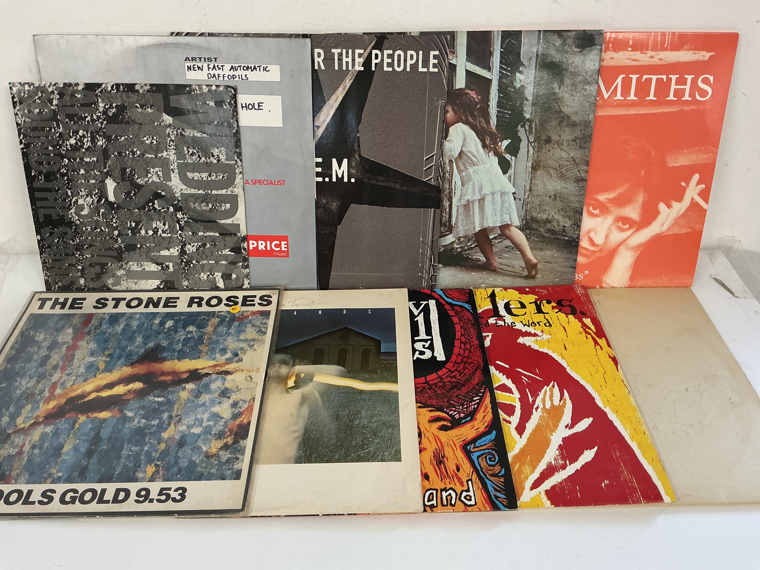 Ten indie/alternative LPs, 10" and 12" singles by various artists including The Stone Roses, The Smiths, Cocteau Twins and others.