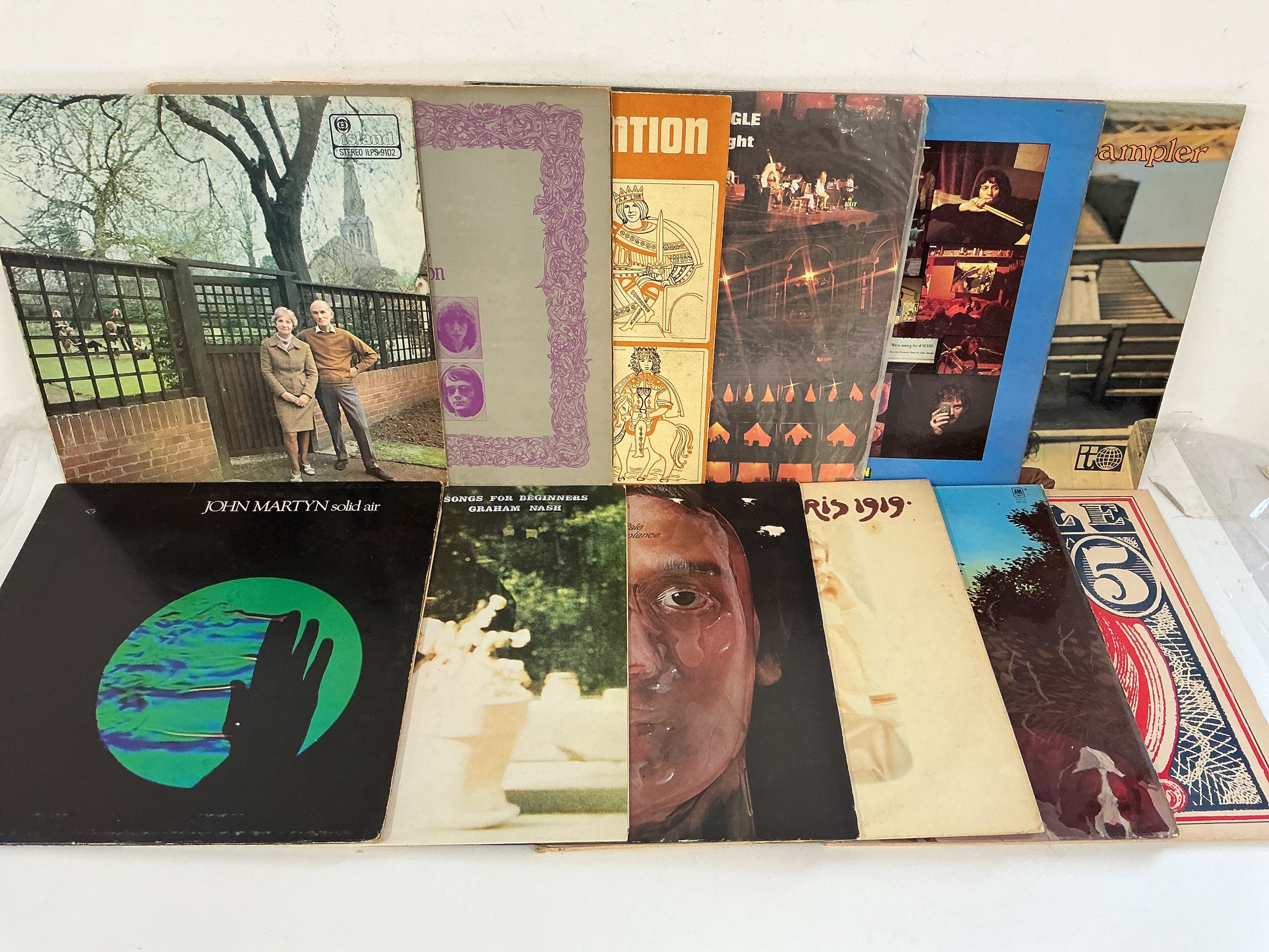 Twelve folk rock LPs by various artists including Fairport Convention, Pentangle, John Martyn and others.